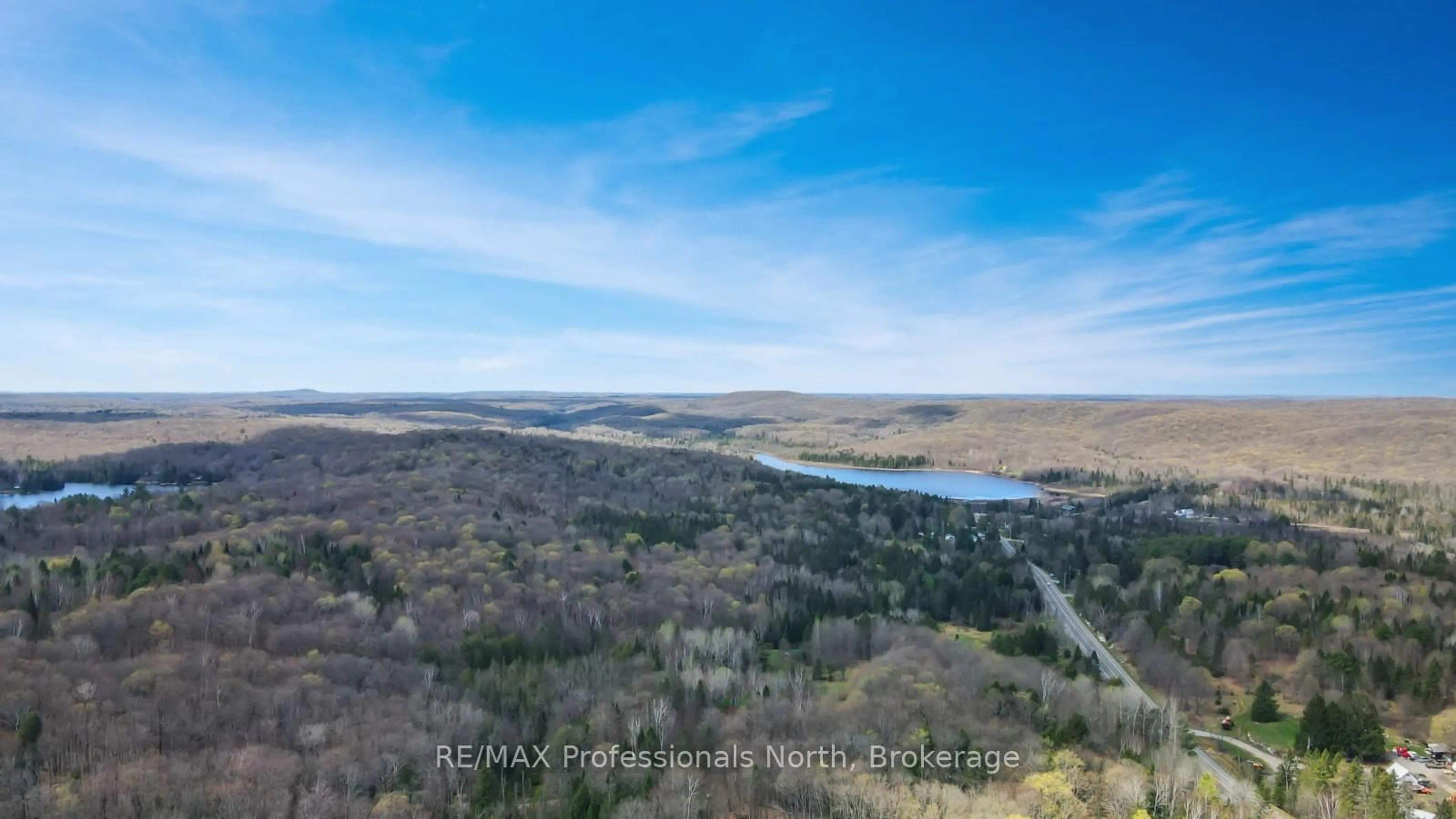 A pic from outside/outdoor area/front of a property/back of a property/a pic from drone, water/lake/river/ocean view for 18917 Highway 118 N/A, Highlands East Ontario K0L 2Y0