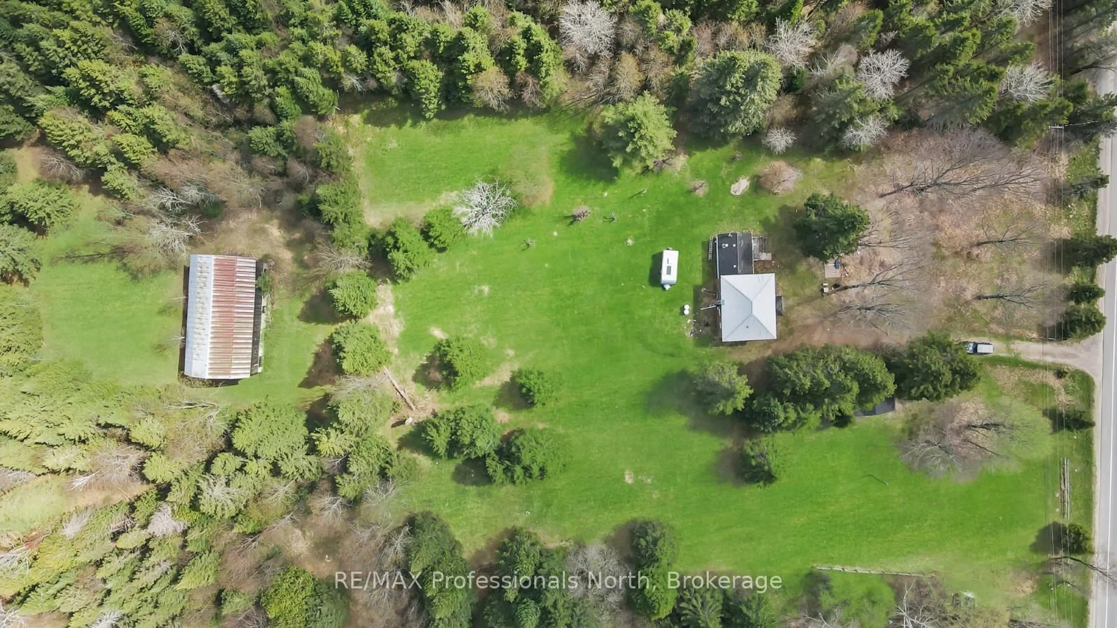 A pic from outside/outdoor area/front of a property/back of a property/a pic from drone, forest/trees view for 18917 Highway 118 N/A, Highlands East Ontario K0L 2Y0