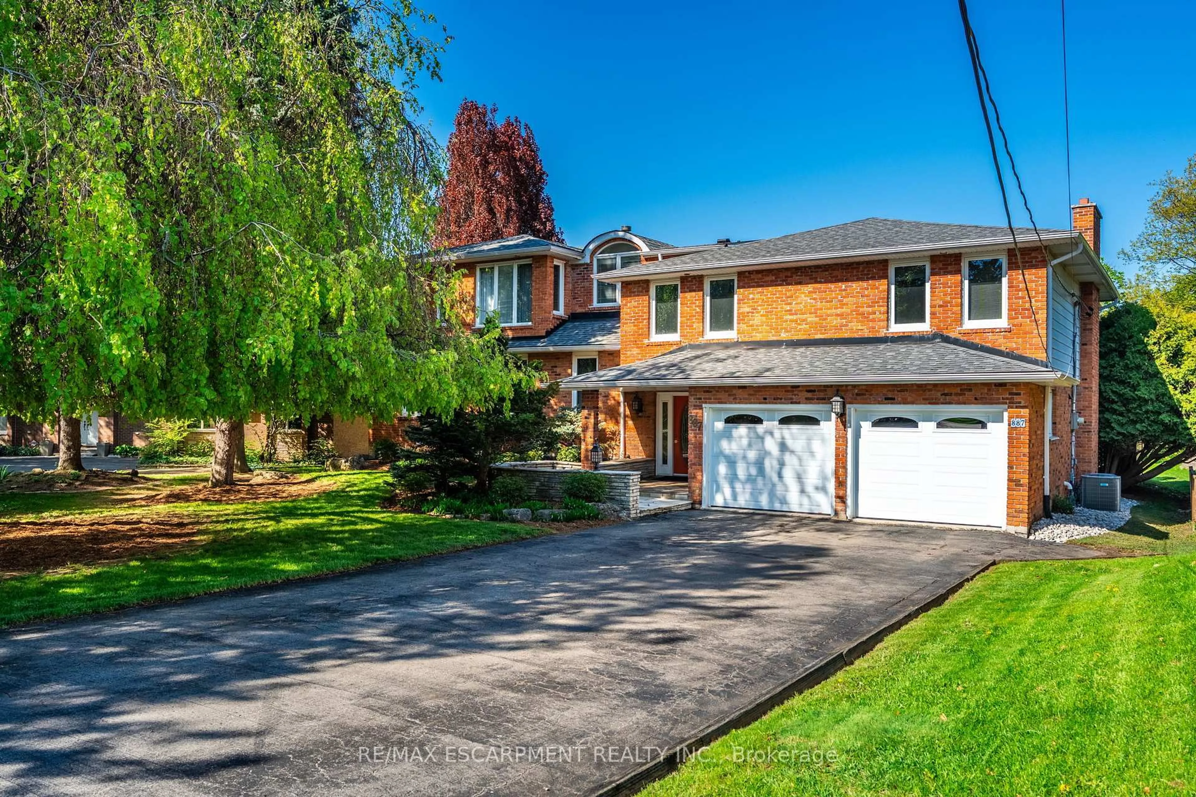 Home with brick exterior material, street for 887 MONTGOMERY Dr, Hamilton Ontario L9G 3H6