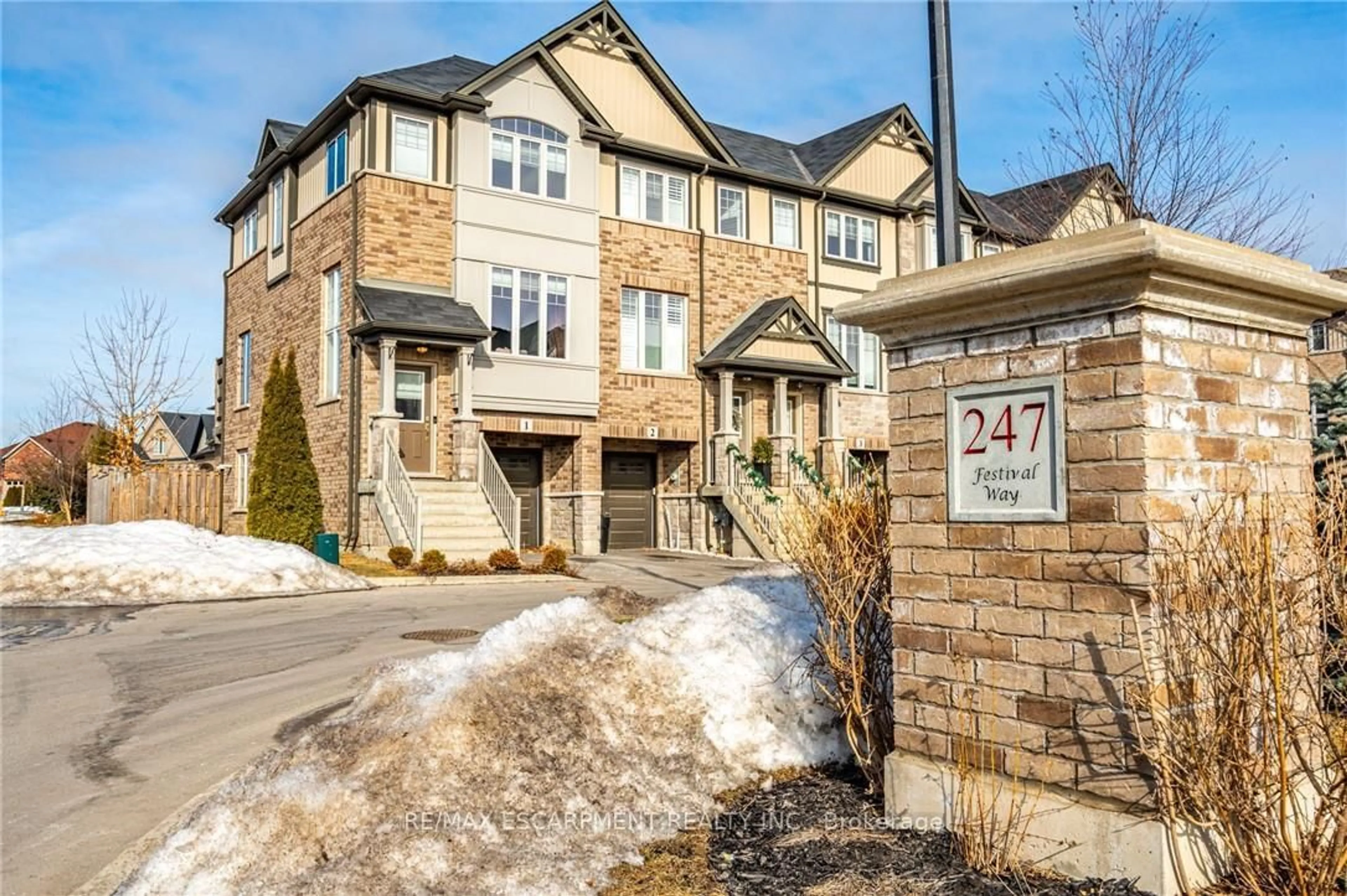 Home with brick exterior material, street for 247 Festival Way #1, Hamilton Ontario L0R 1C0