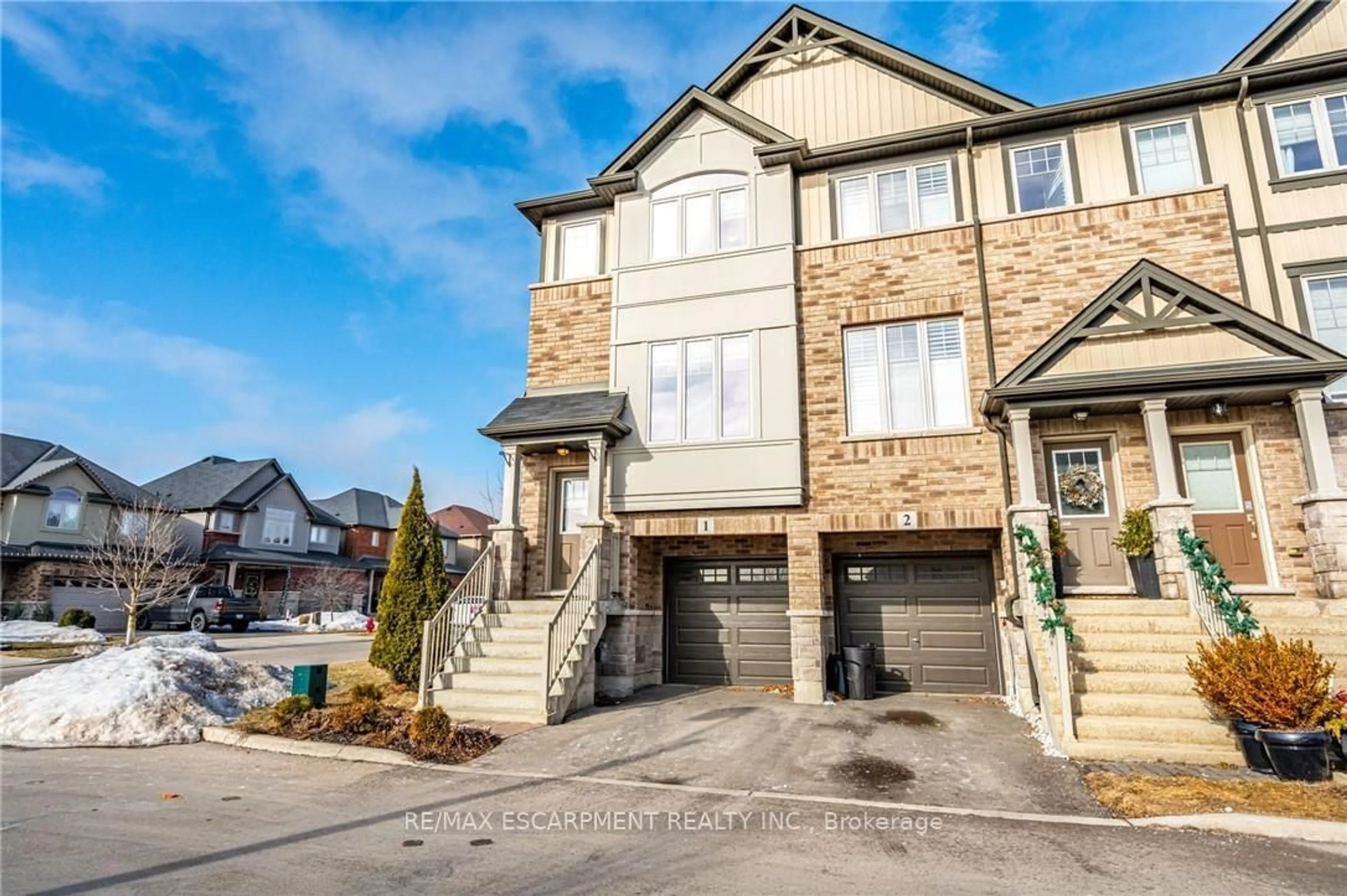 Home with brick exterior material, street for 247 Festival Way #1, Hamilton Ontario L0R 1C0