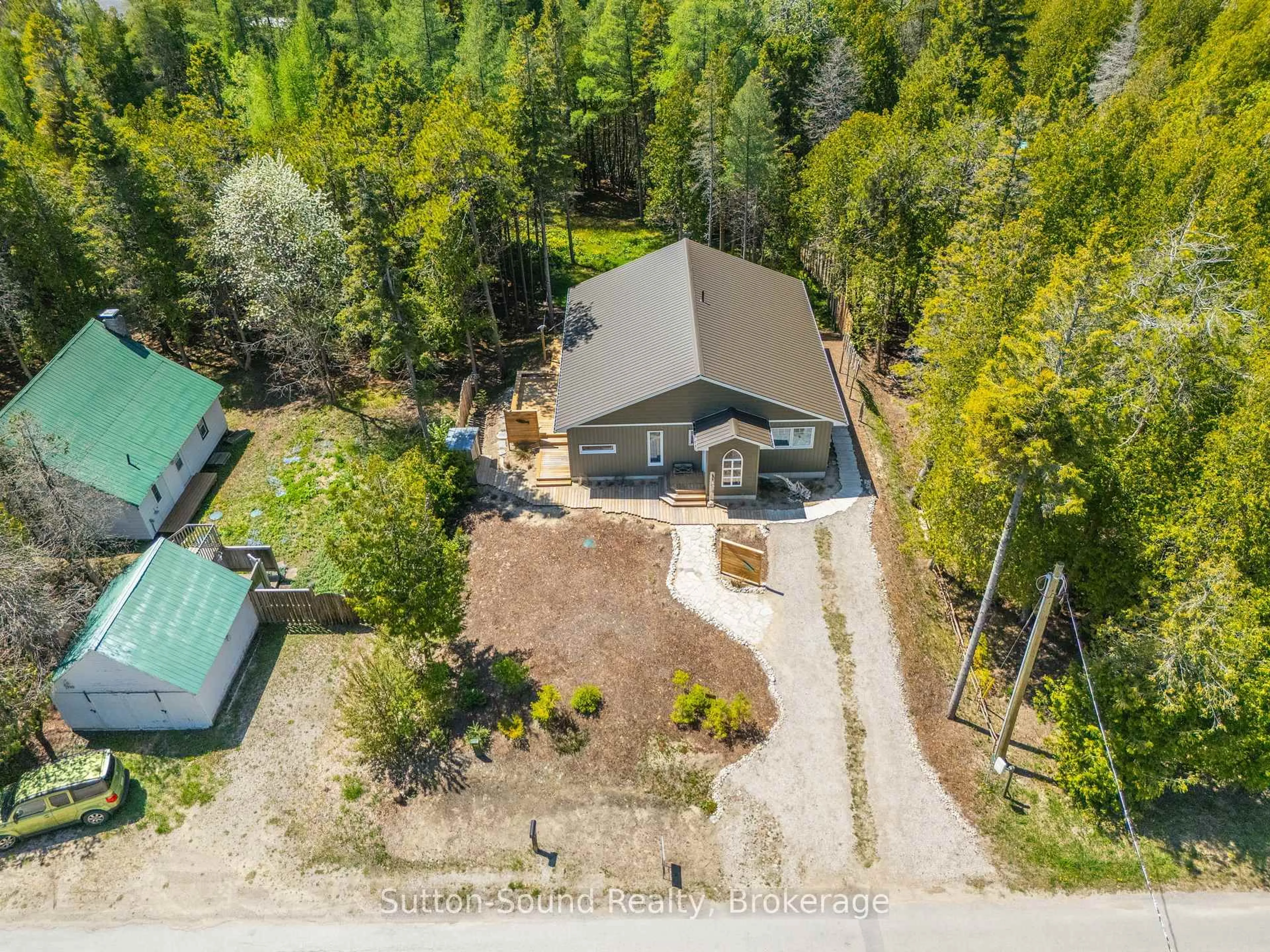 A pic from outside/outdoor area/front of a property/back of a property/a pic from drone, forest/trees view for 914 Second Ave, South Bruce Peninsula Ontario N0H 2G0