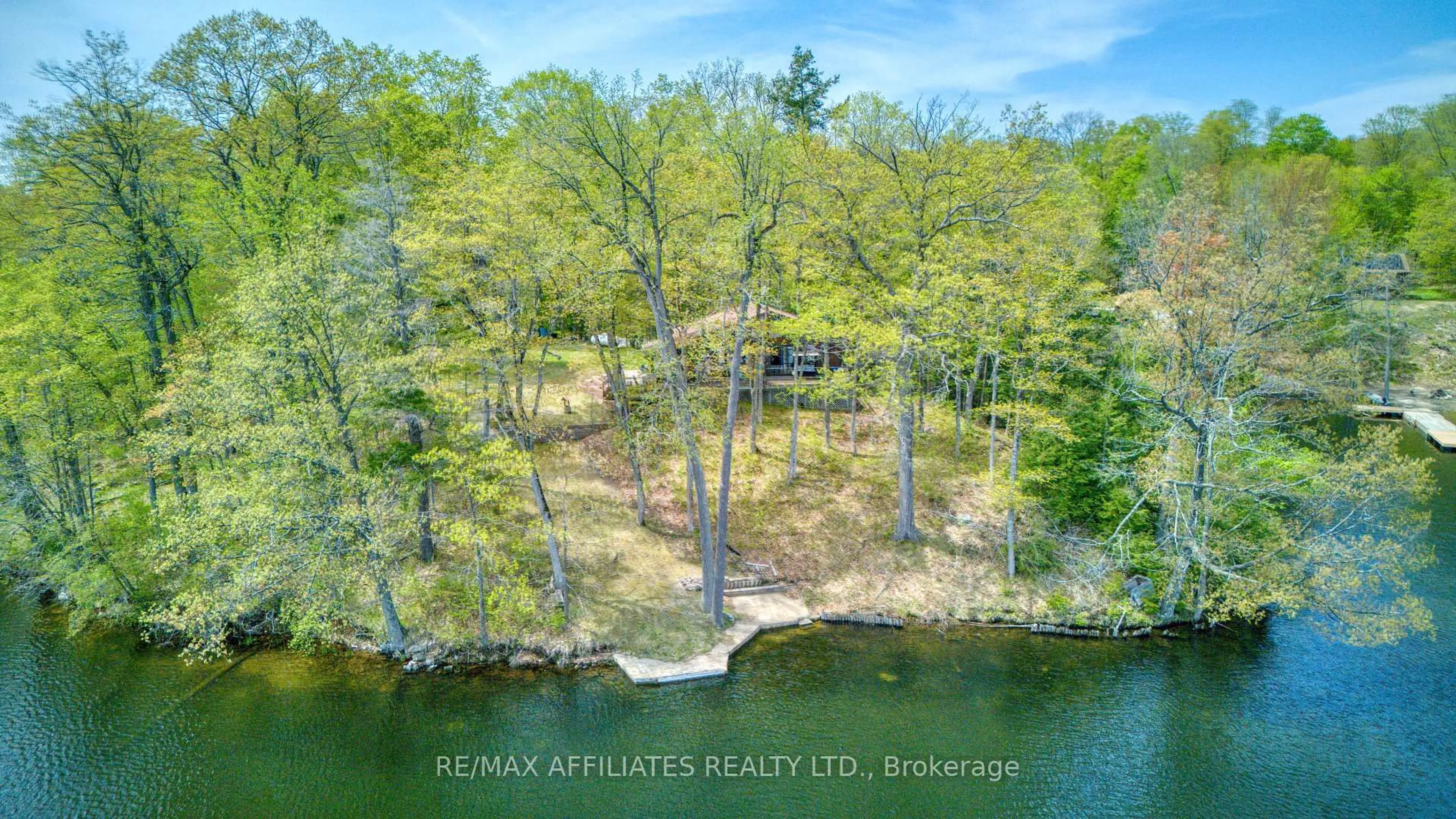 A pic from outside/outdoor area/front of a property/back of a property/a pic from drone, water/lake/river/ocean view for 787 Sherbrooke Dr, Maberly Ontario K0H 2B0