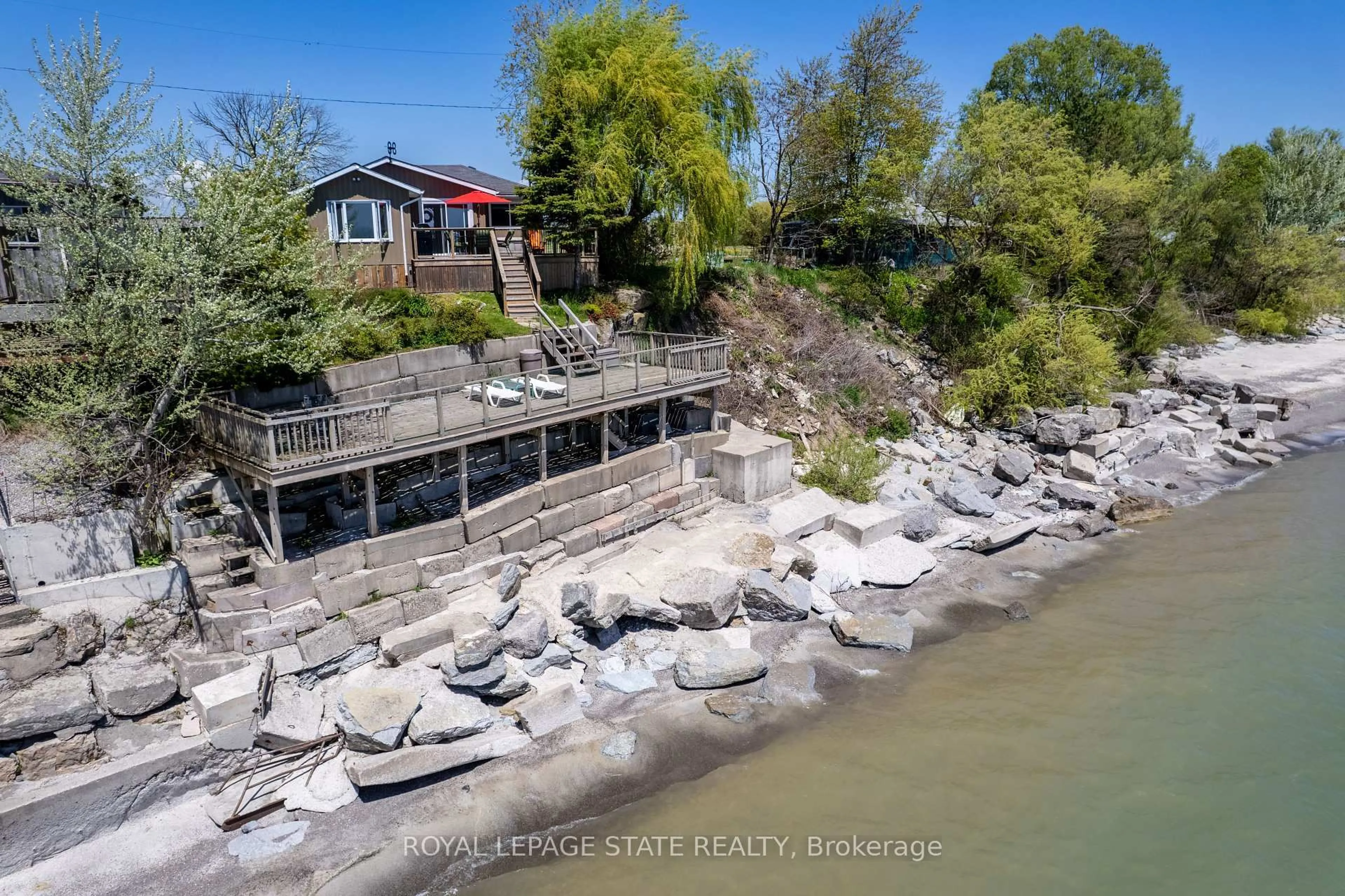 A pic from outside/outdoor area/front of a property/back of a property/a pic from drone, water/lake/river/ocean view for 33 Gull Line, Haldimand Ontario N0A 1K0