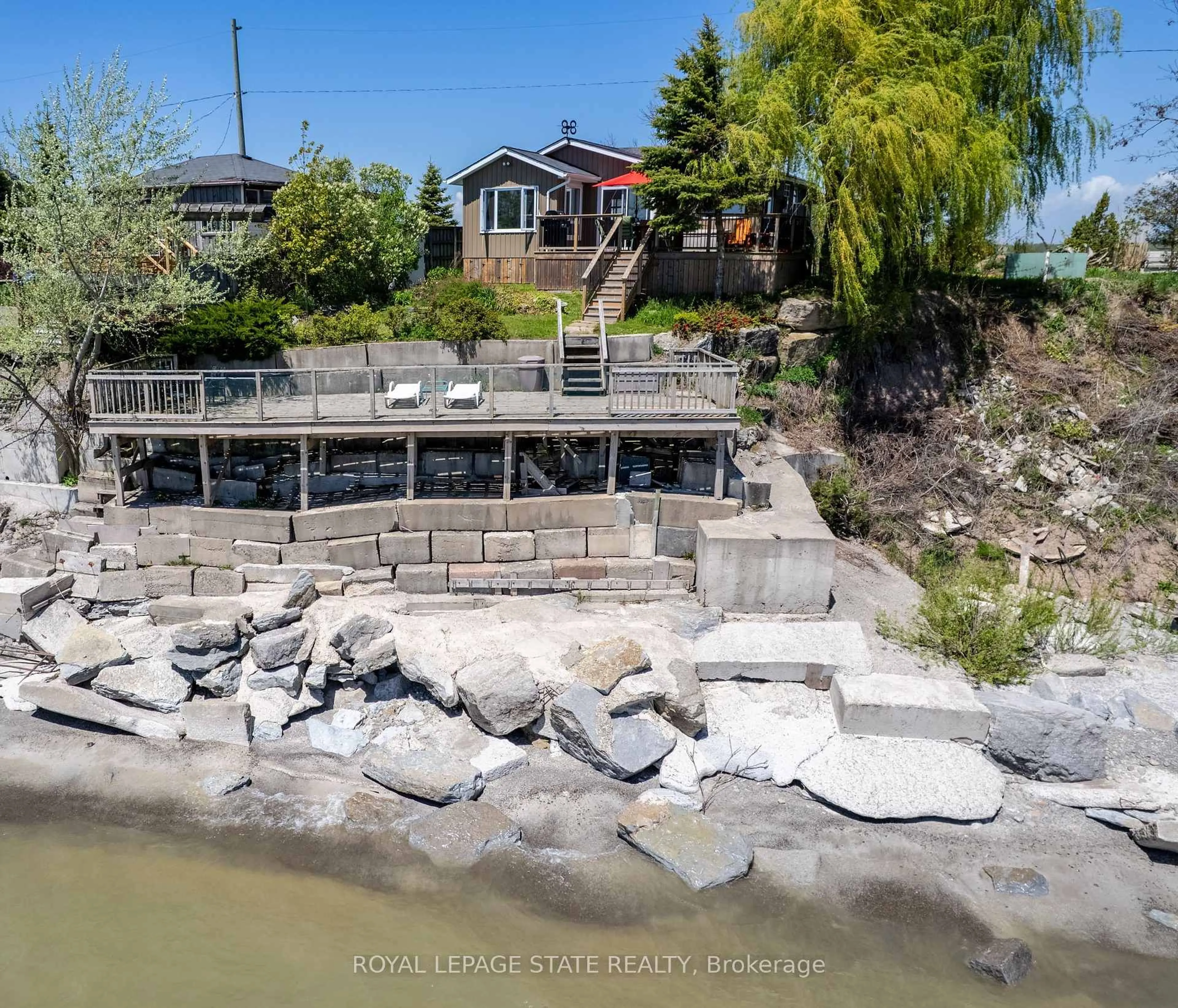A pic from outside/outdoor area/front of a property/back of a property/a pic from drone, water/lake/river/ocean view for 33 Gull Line, Haldimand Ontario N0A 1K0