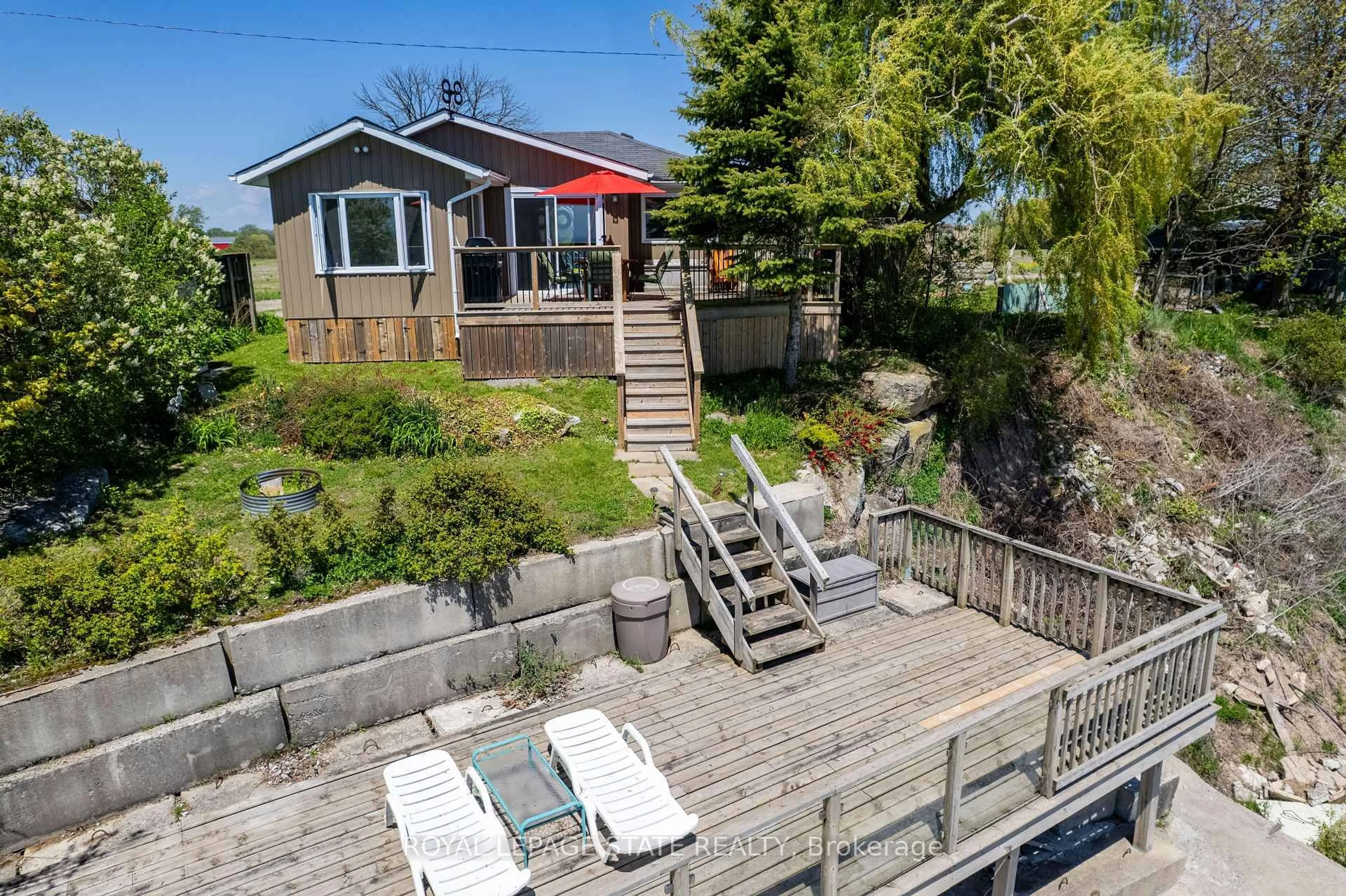 A pic from outside/outdoor area/front of a property/back of a property/a pic from drone, water/lake/river/ocean view for 33 Gull Line, Haldimand Ontario N0A 1K0