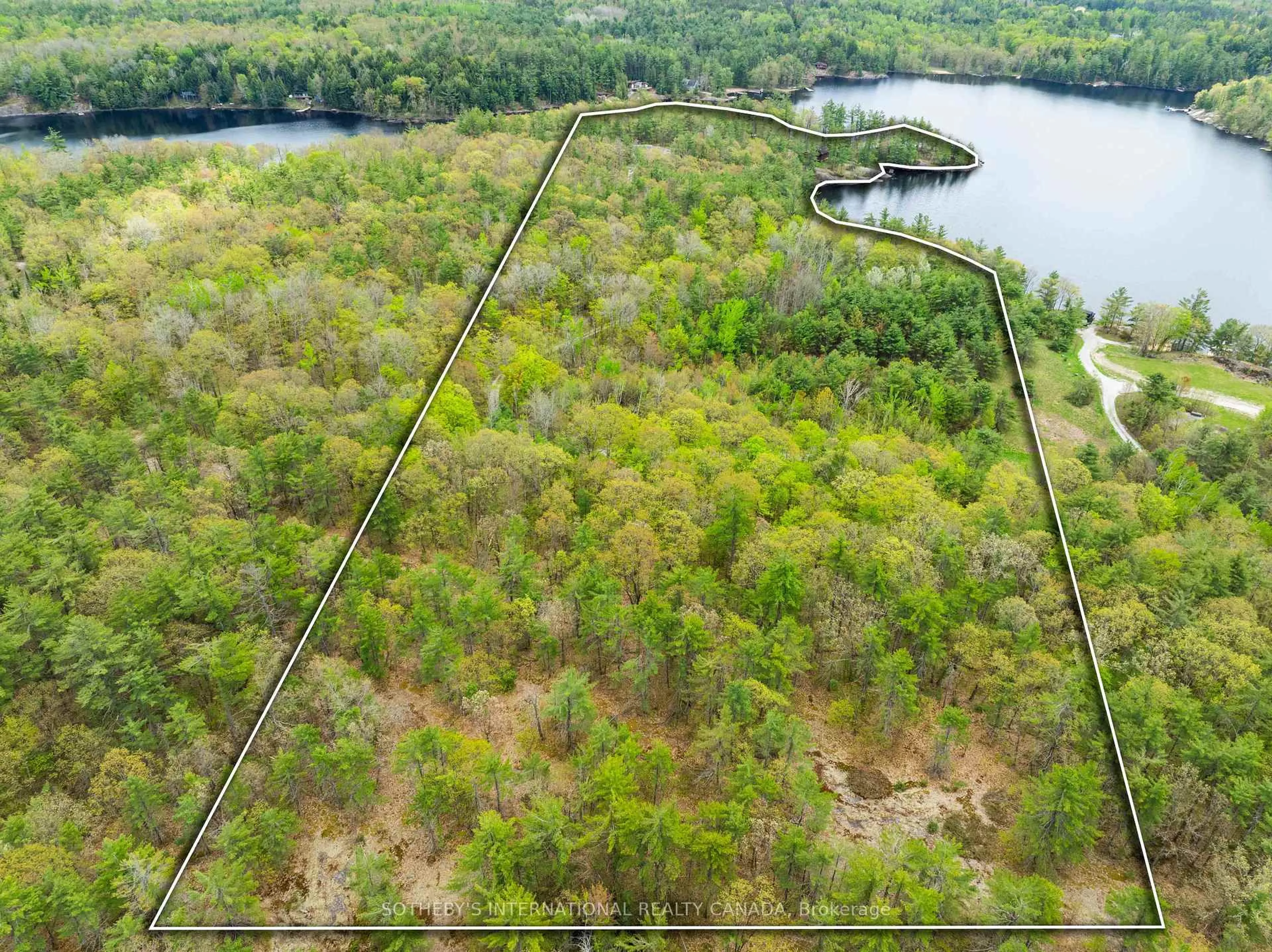 A pic from outside/outdoor area/front of a property/back of a property/a pic from drone, water/lake/river/ocean view for 1074 Cooks Rd, Gravenhurst Ontario P1P 1R3