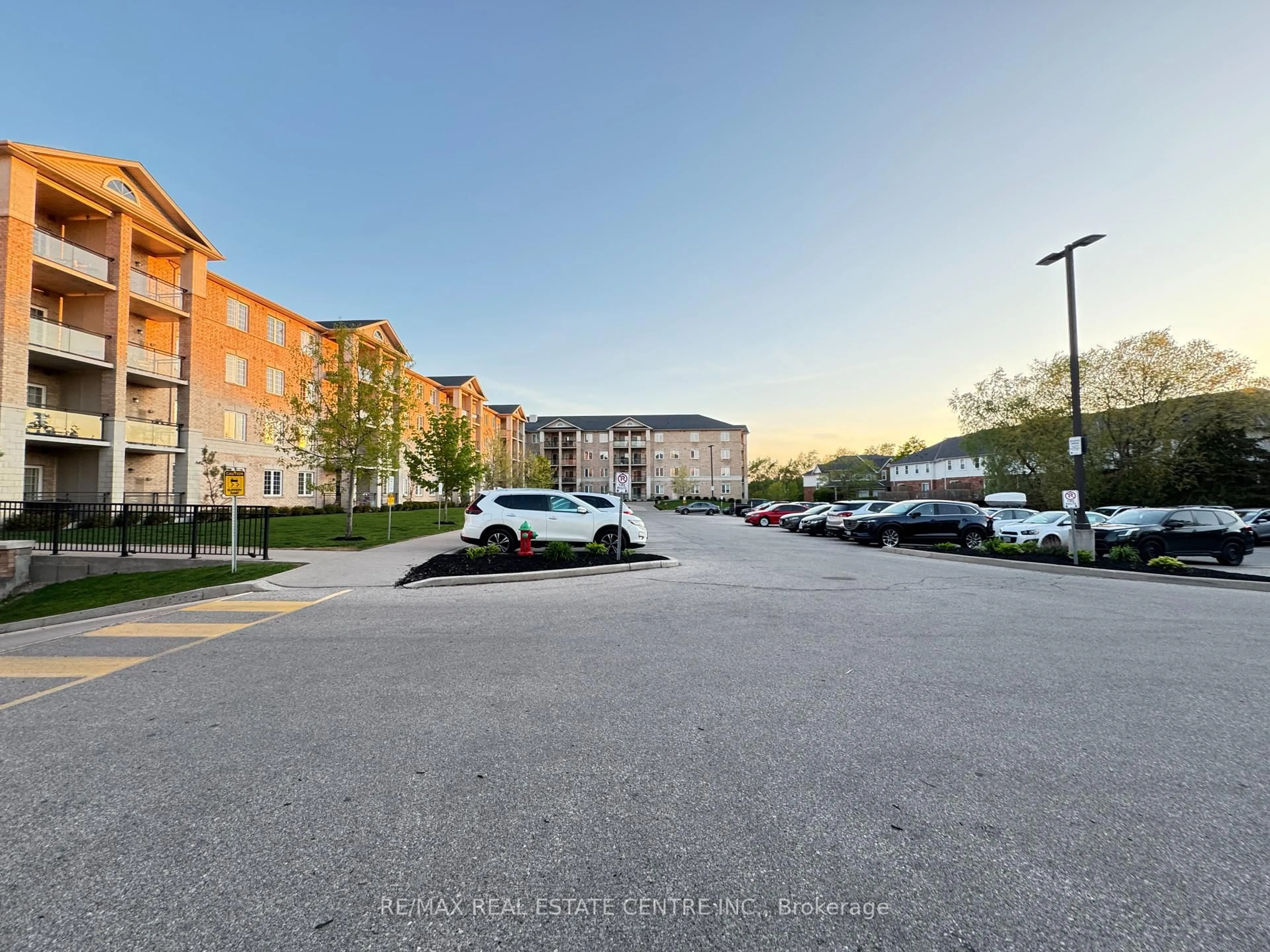A pic from outside/outdoor area/front of a property/back of a property/a pic from drone, street for 1083 Gordon St #111, Guelph Ontario N1G 0E8