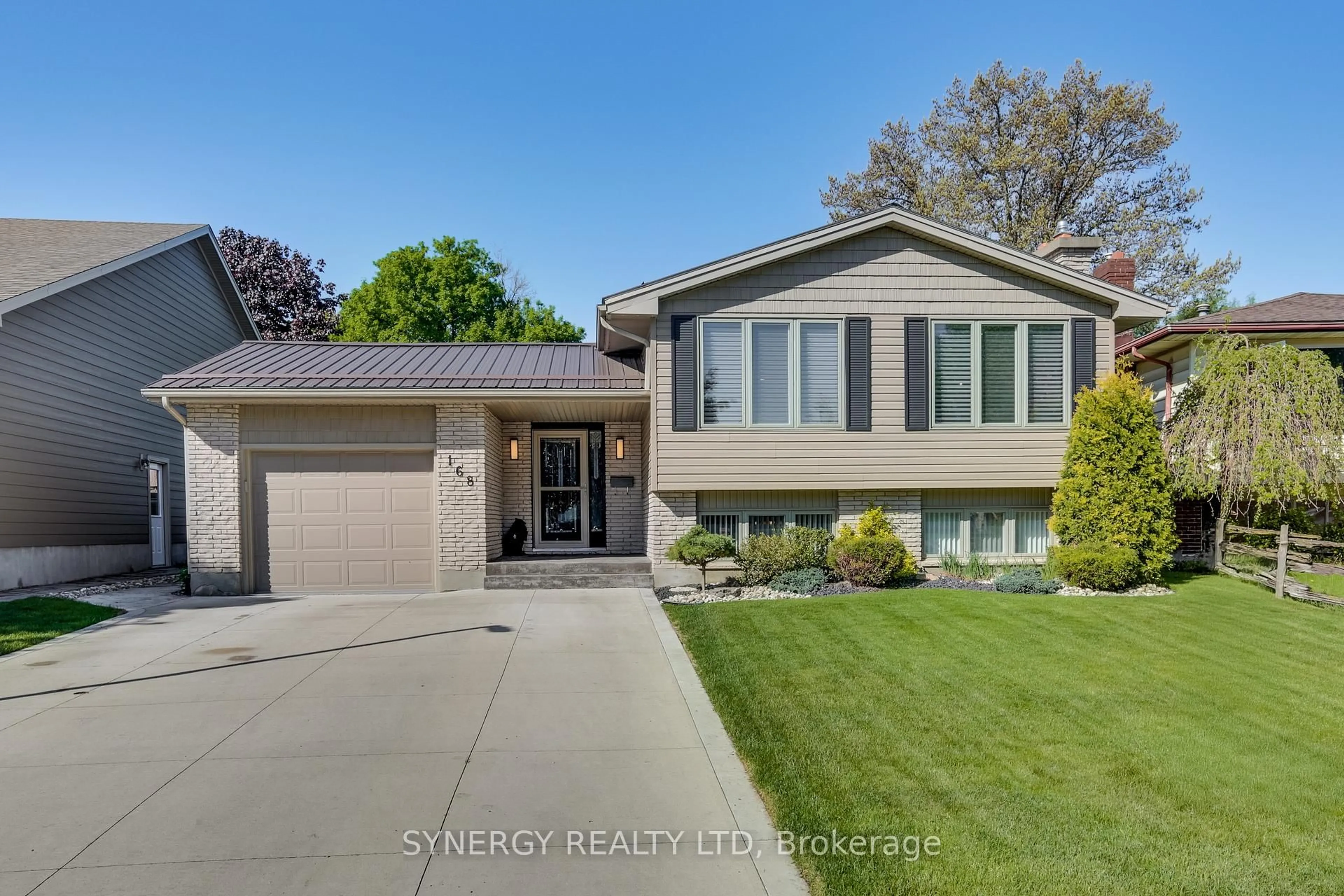Home with vinyl exterior material, street for 168 Southfield Dr, Strathroy Caradoc Ontario N7G 3V4