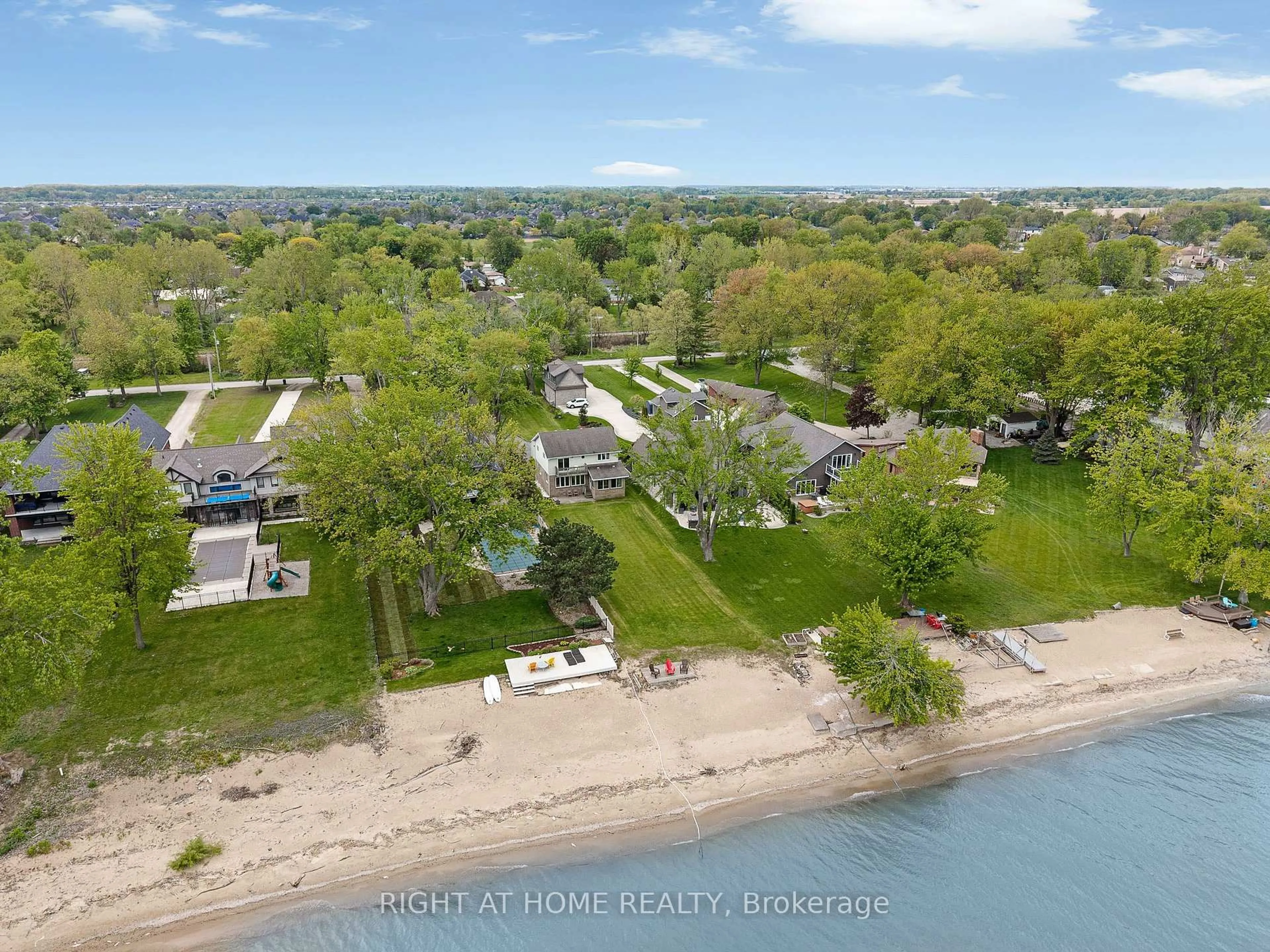 A pic from outside/outdoor area/front of a property/back of a property/a pic from drone, water/lake/river/ocean view for 1040 Lilydale Ave, Lakeshore Ontario N8L 0Z2
