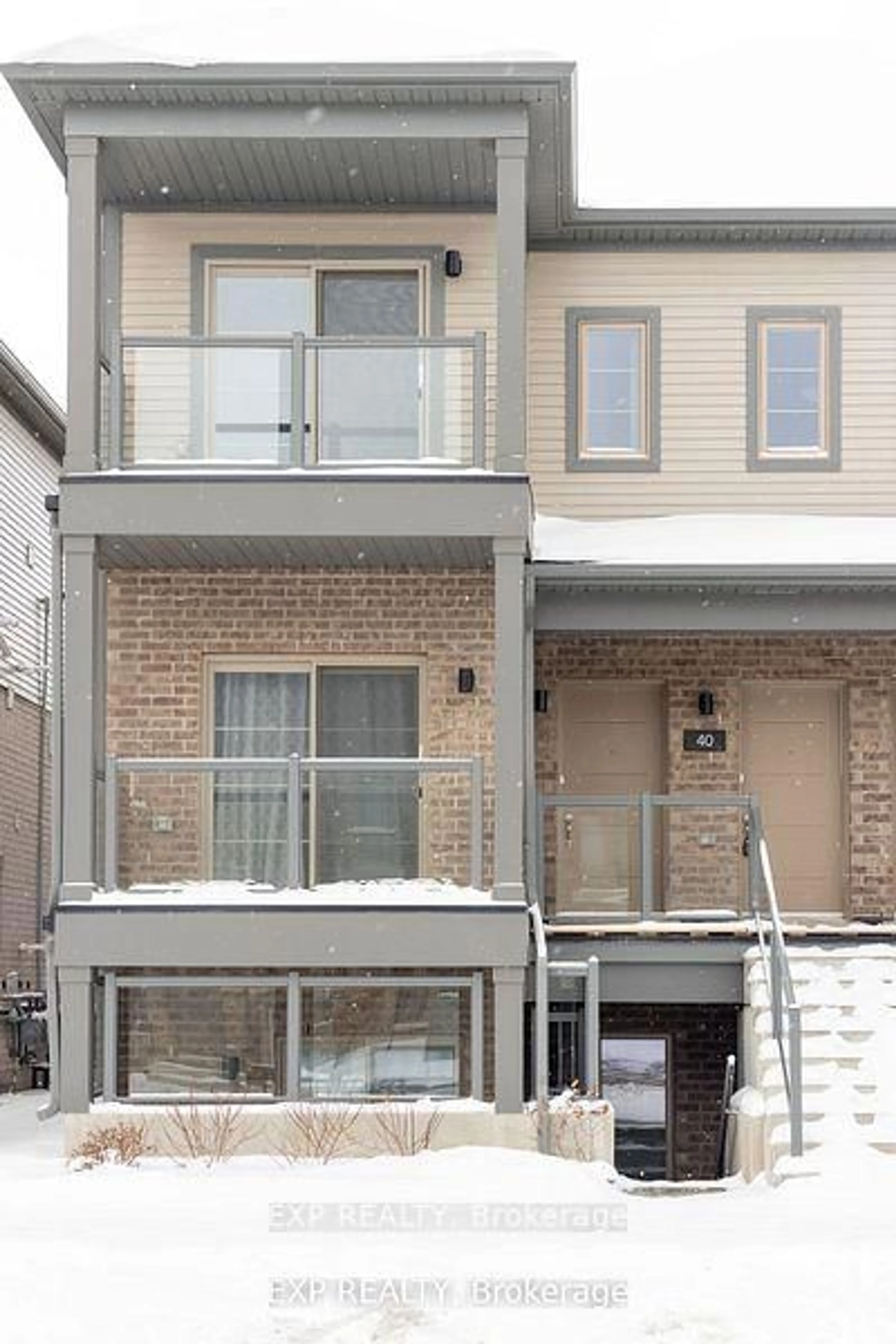 Home with brick exterior material, street for 205 West Oak Tr #40, Kitchener Ontario N2R 0R9