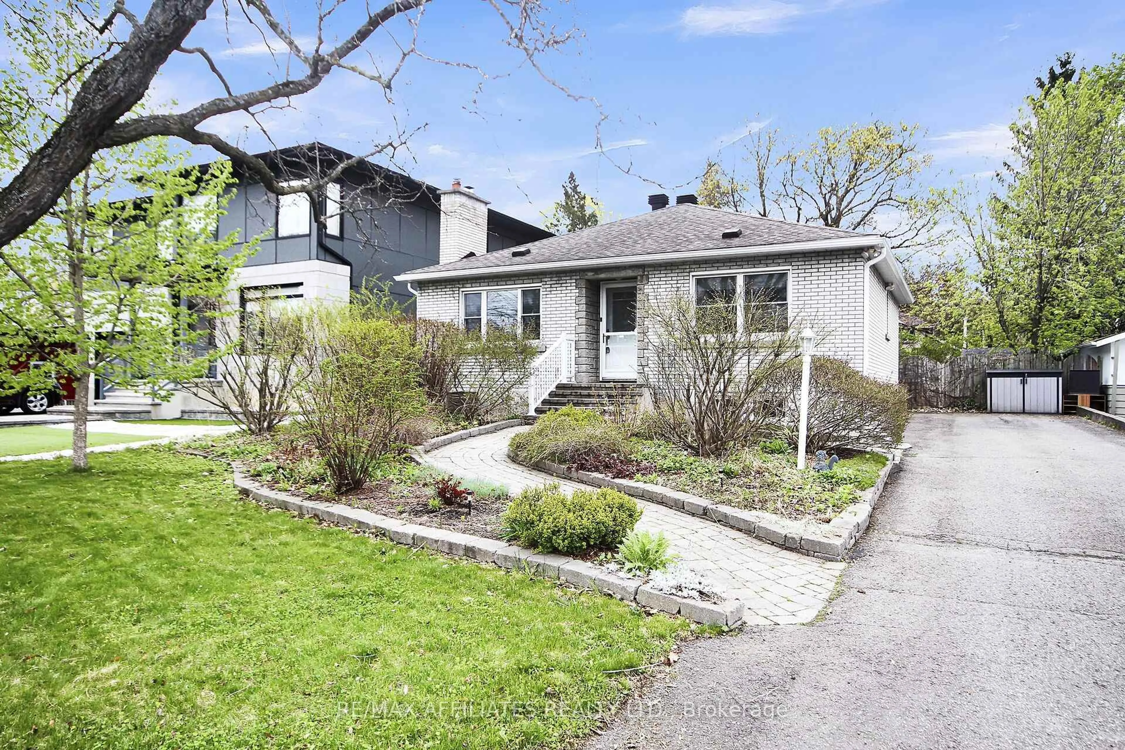 Home with brick exterior material, street for 312 Mountbatten Ave, Ottawa Ontario K1H 5W3