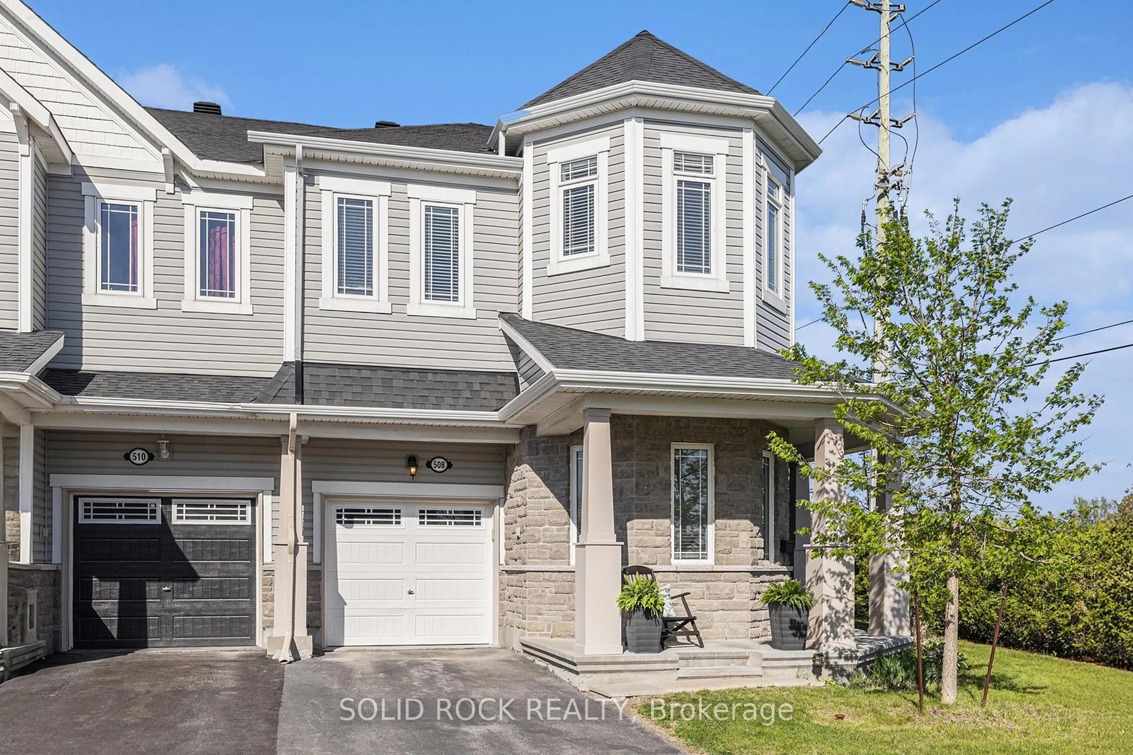 Home with vinyl exterior material, street for 508 Acceptance Pl, Ottawa Ontario K2M 2T6