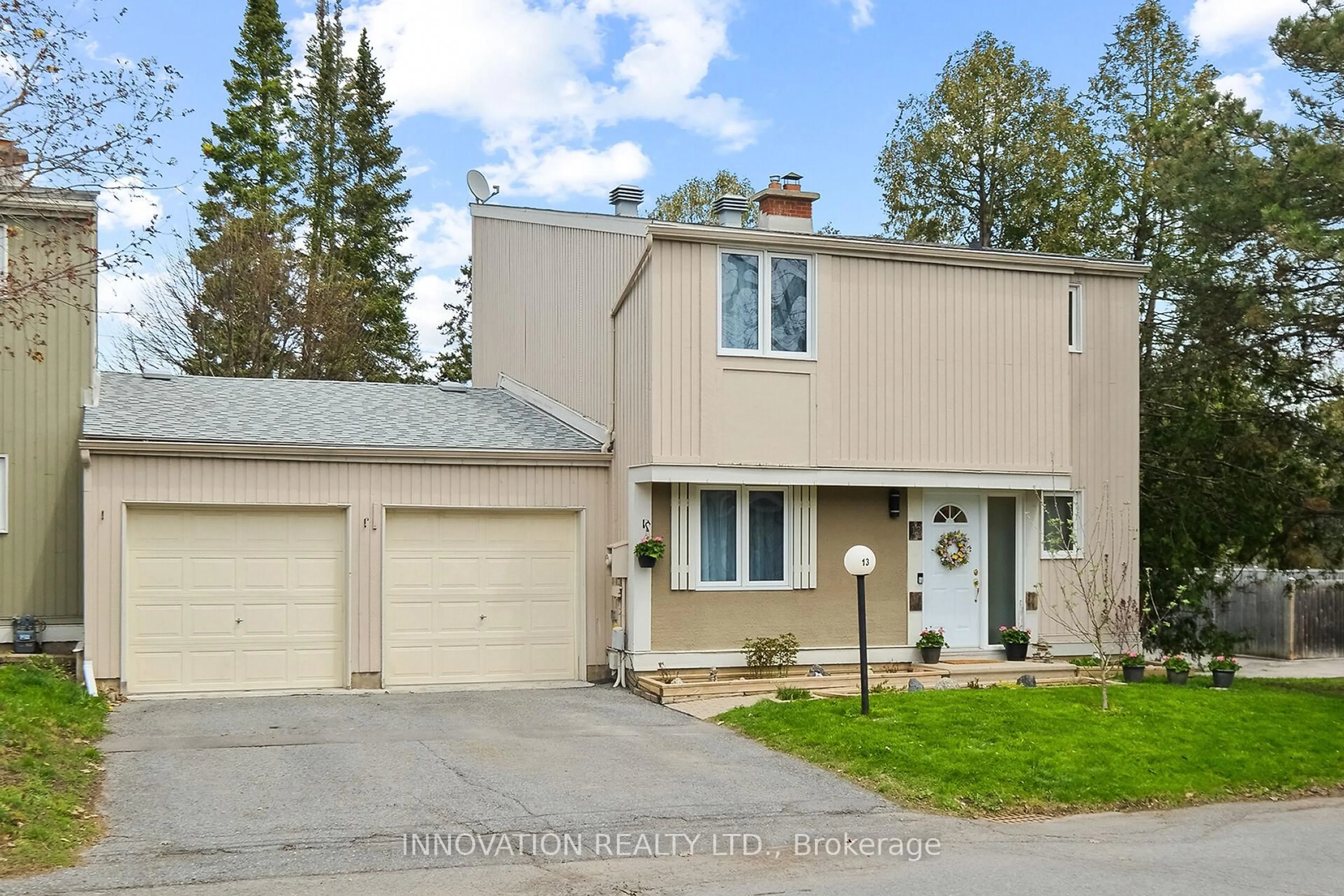 Home with vinyl exterior material, street for 13 Jackson Crt, Ottawa Ontario K2K 1B6