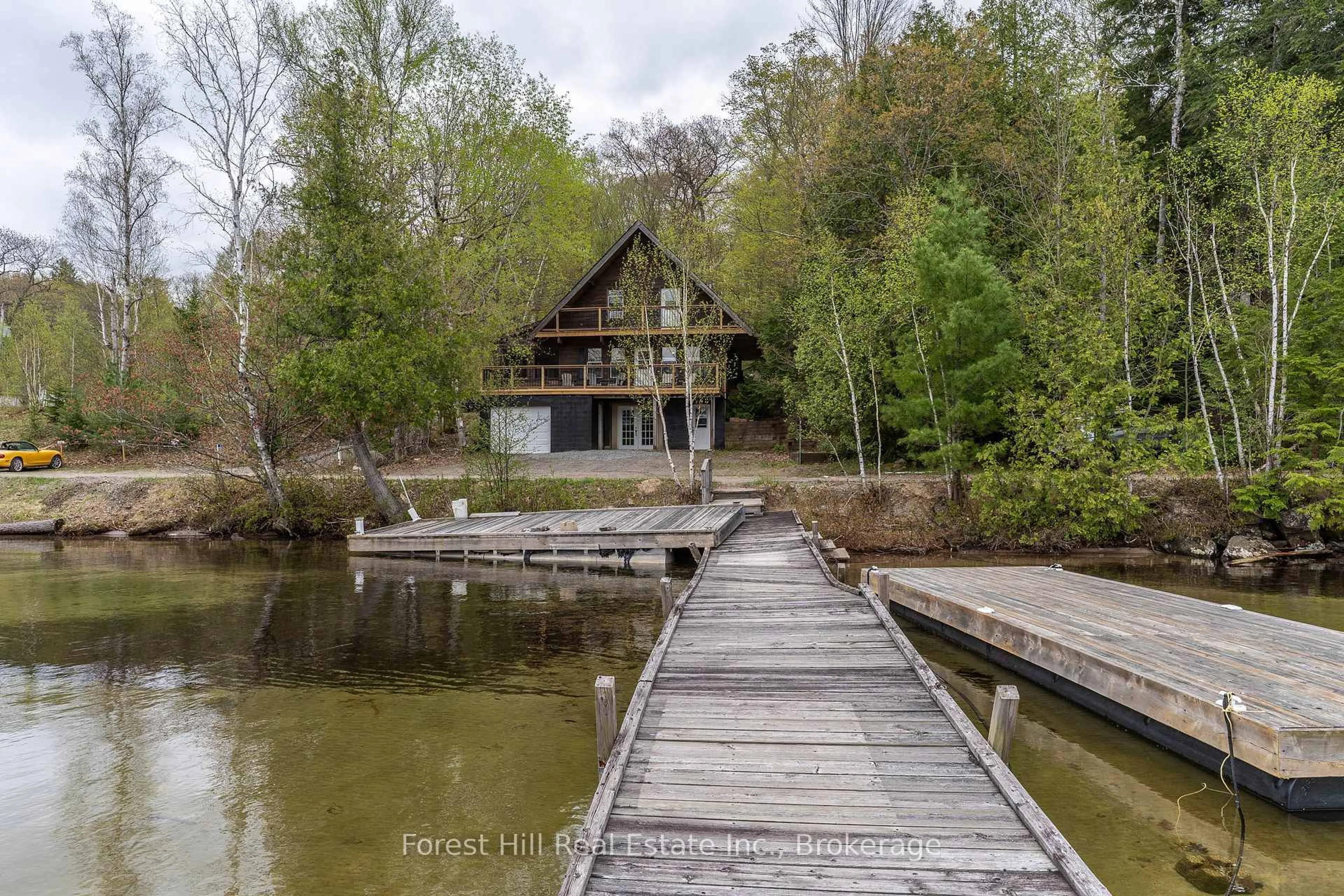 A pic from outside/outdoor area/front of a property/back of a property/a pic from drone, water/lake/river/ocean view for 1255 Skeleton Lake 2 Rd, Muskoka Lakes Ontario P0G 1G0