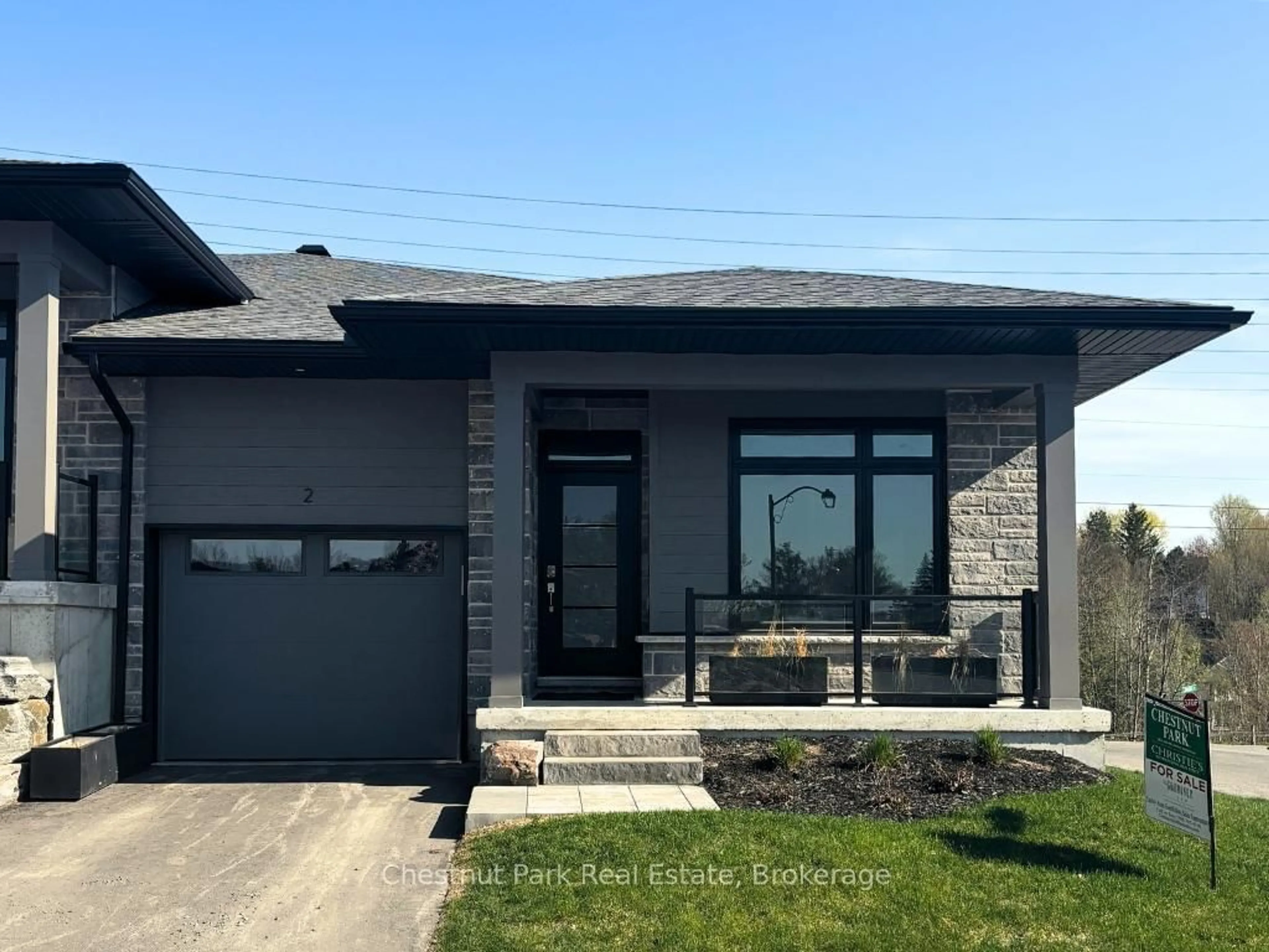 Home with brick exterior material, street for 2 BLACK SPRUCE St, Huntsville Ontario P1H 1M3