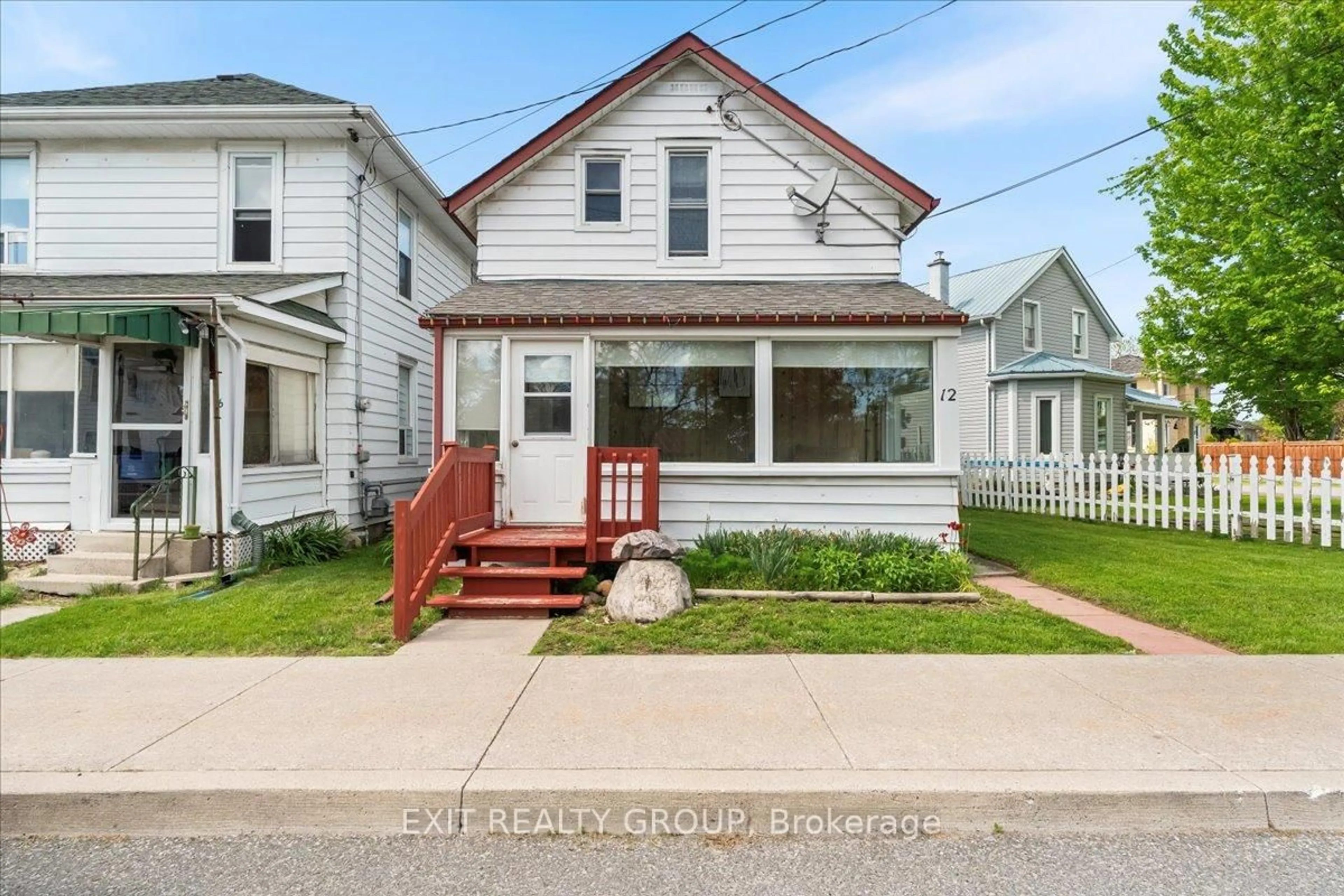 Home with vinyl exterior material, street for 12 Garry St, Trent Hills Ontario K0L 1L0