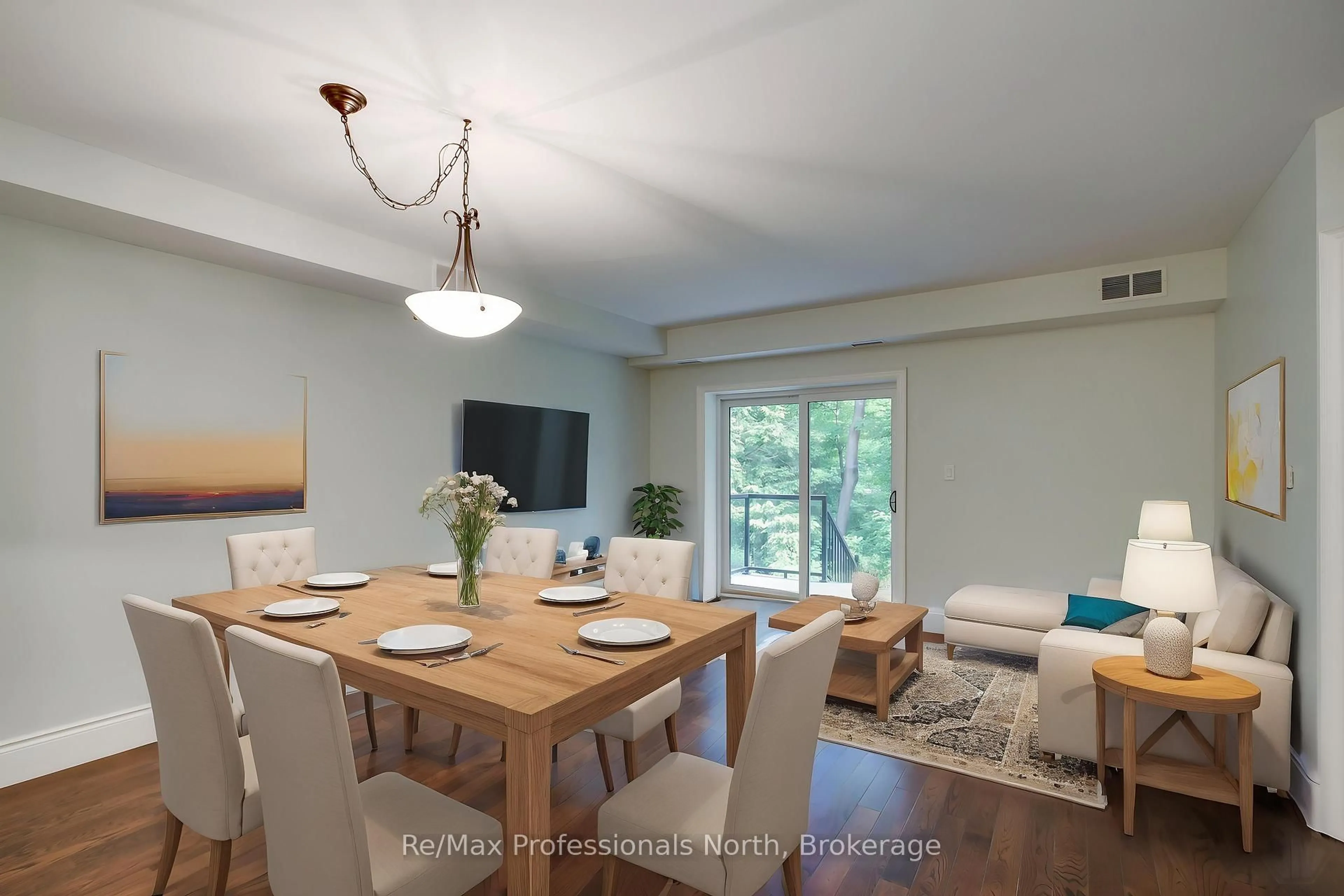 Living room with furniture, wood/laminate floor for 391 JAMES St #104, Gravenhurst Ontario P1P 0A5