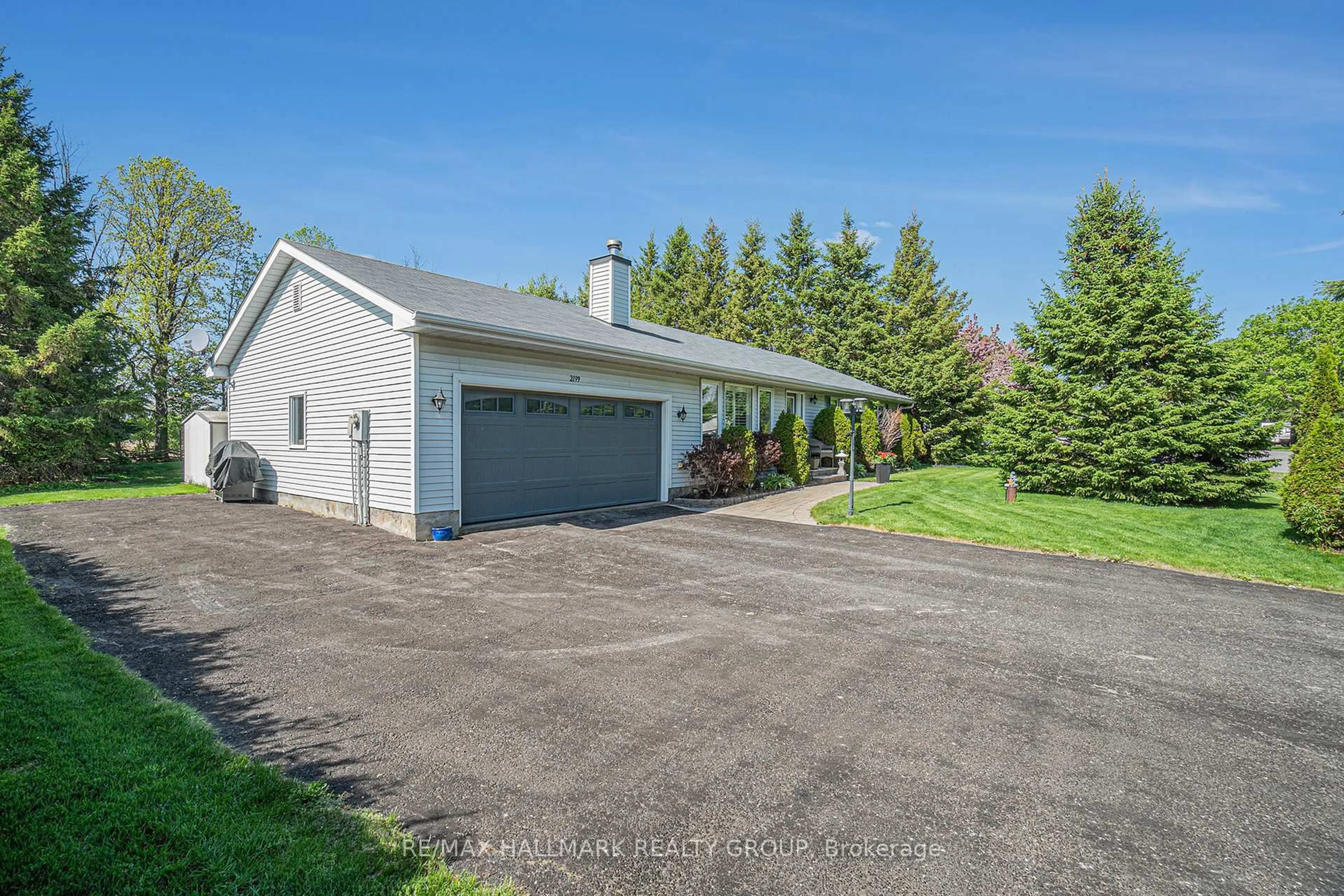 A pic from outside/outdoor area/front of a property/back of a property/a pic from drone, street for 2199 Wallingford Way, North Gower Ontario K0A 2T0
