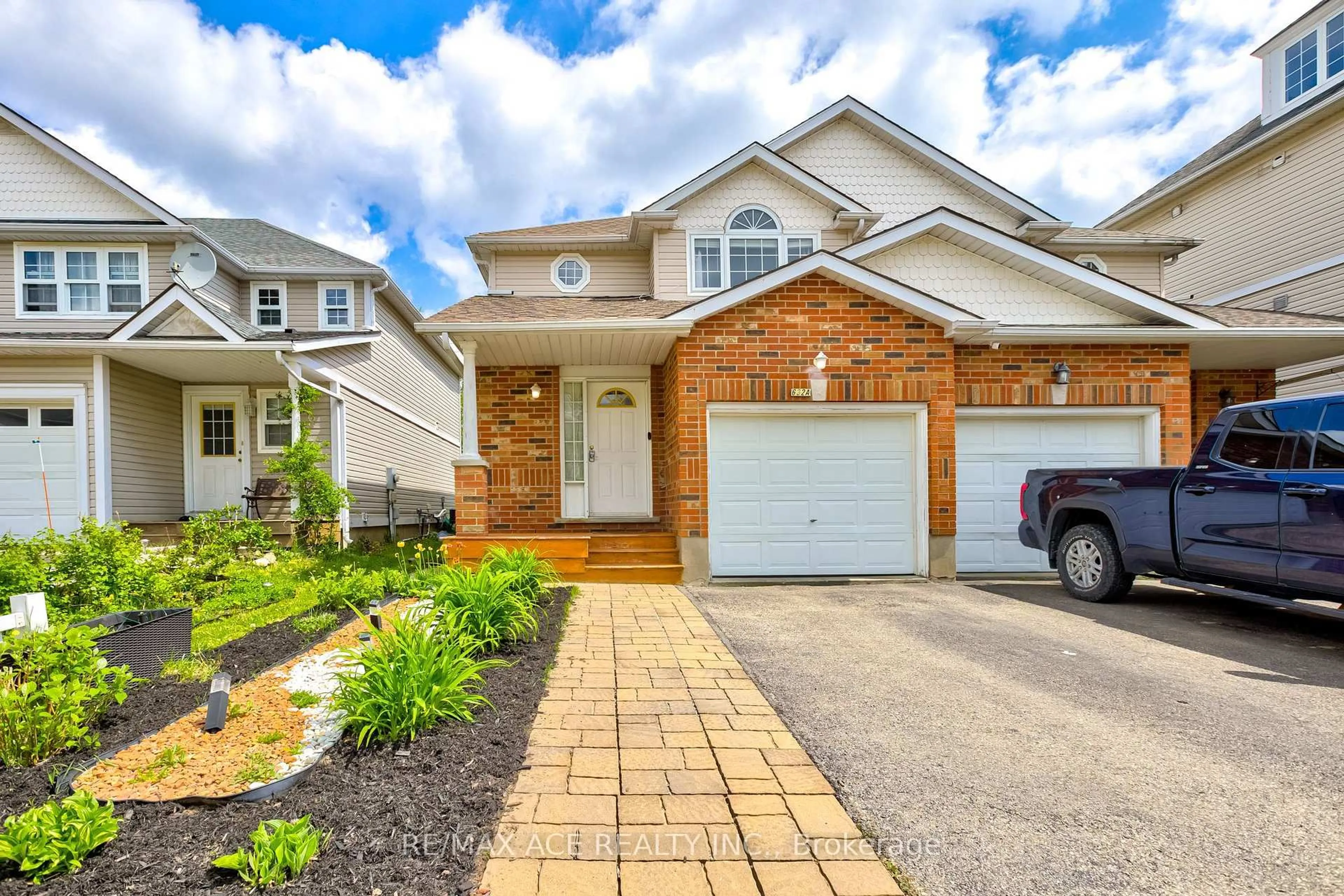 Home with brick exterior material, street for 632A Basswood St, Waterloo Ontario N2V 2K8