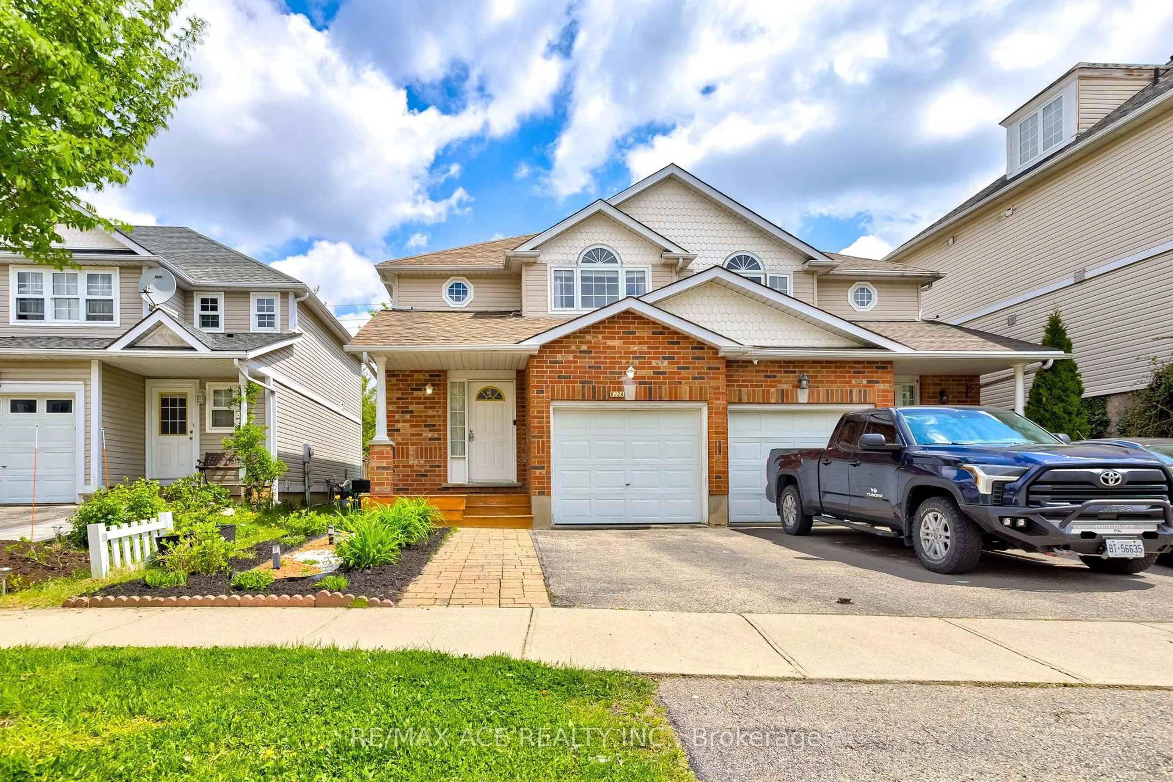 Home with brick exterior material, street for 632A Basswood St, Waterloo Ontario N2V 2K8