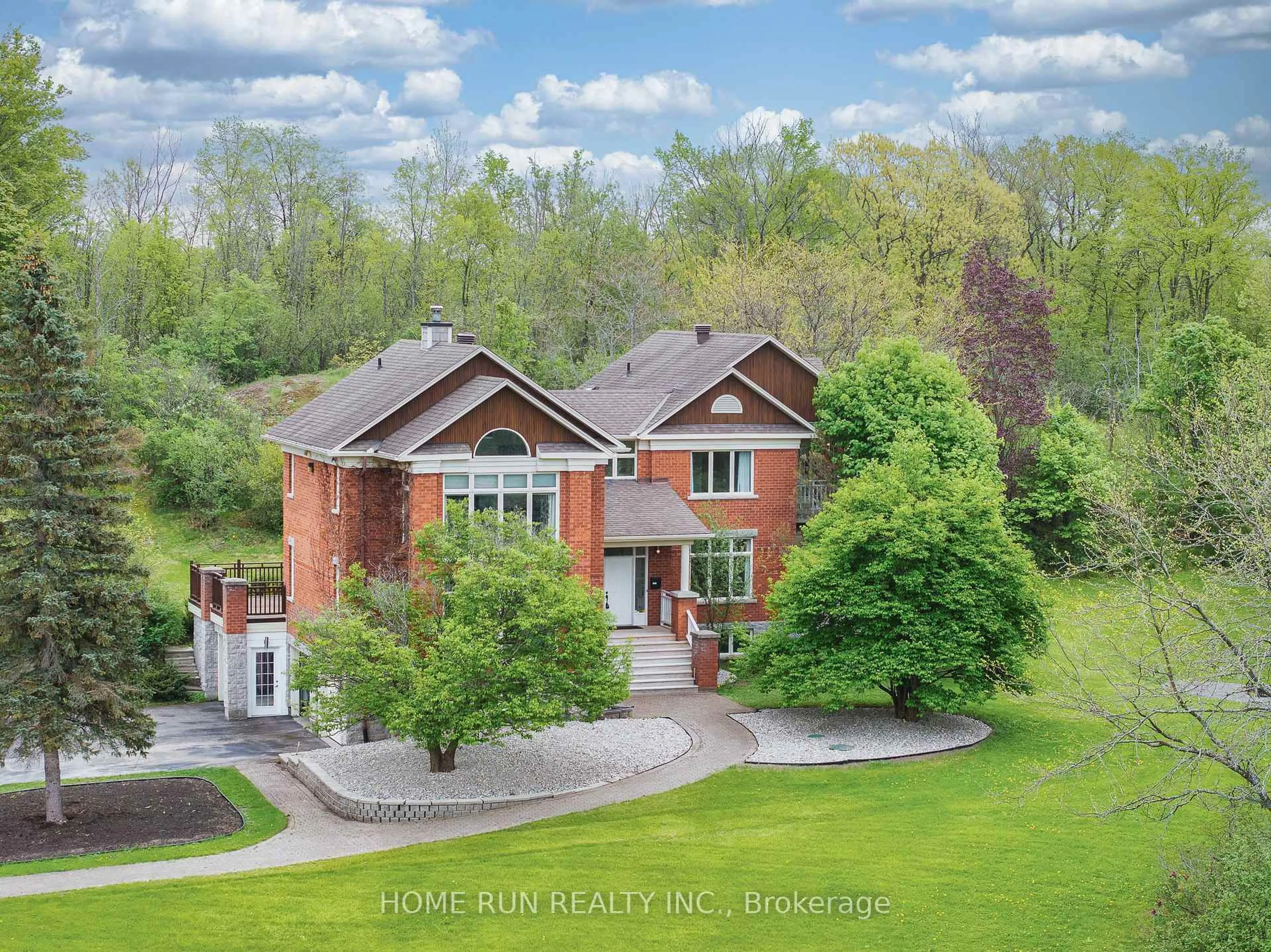 A pic from outside/outdoor area/front of a property/back of a property/a pic from drone, unknown for 112 Lochcarron Cres, Carp Ontario K0A 1L0