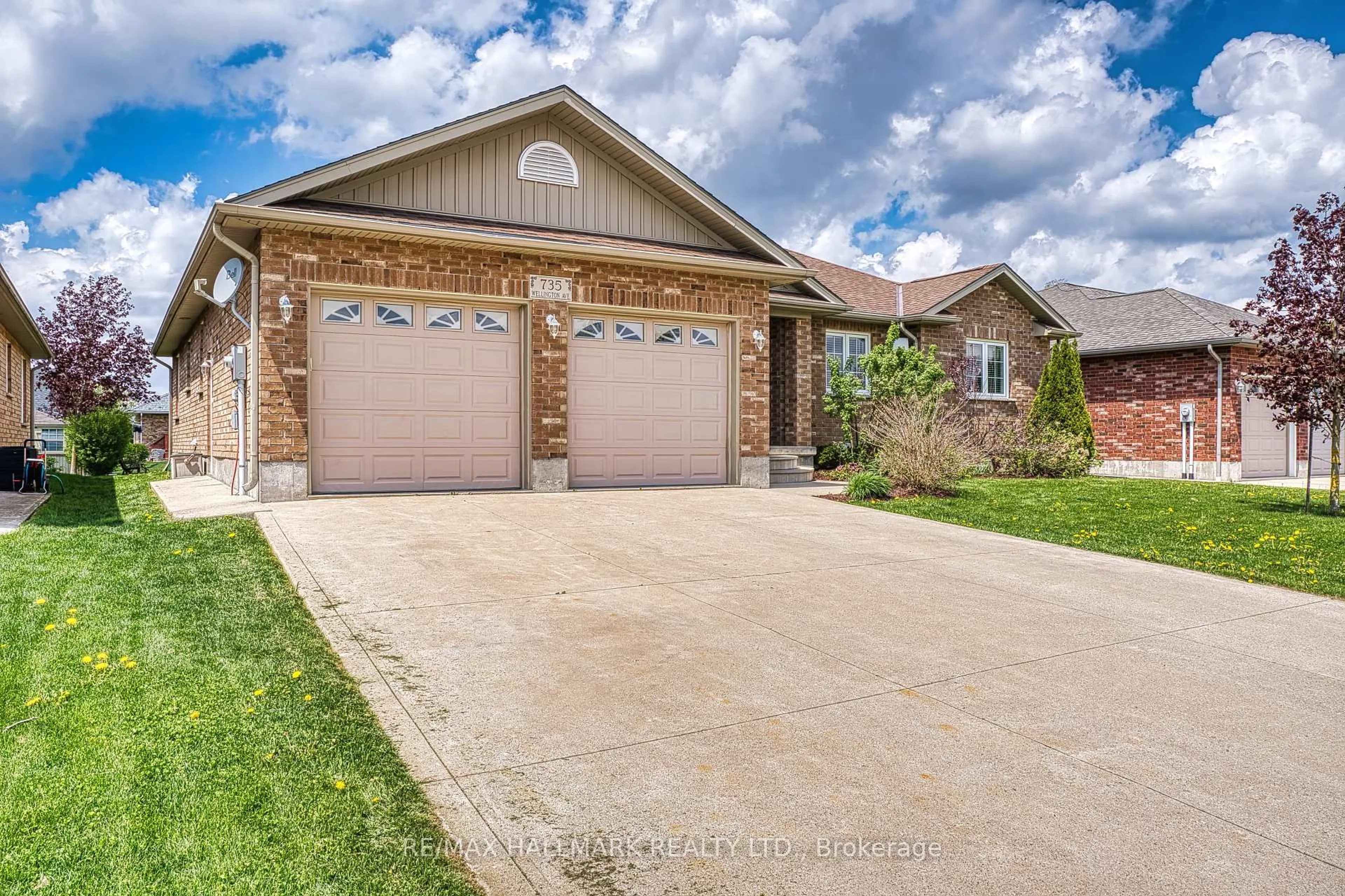 Home with brick exterior material, street for 735 WELLINGTON Ave, North Perth Ontario N4W 3S8