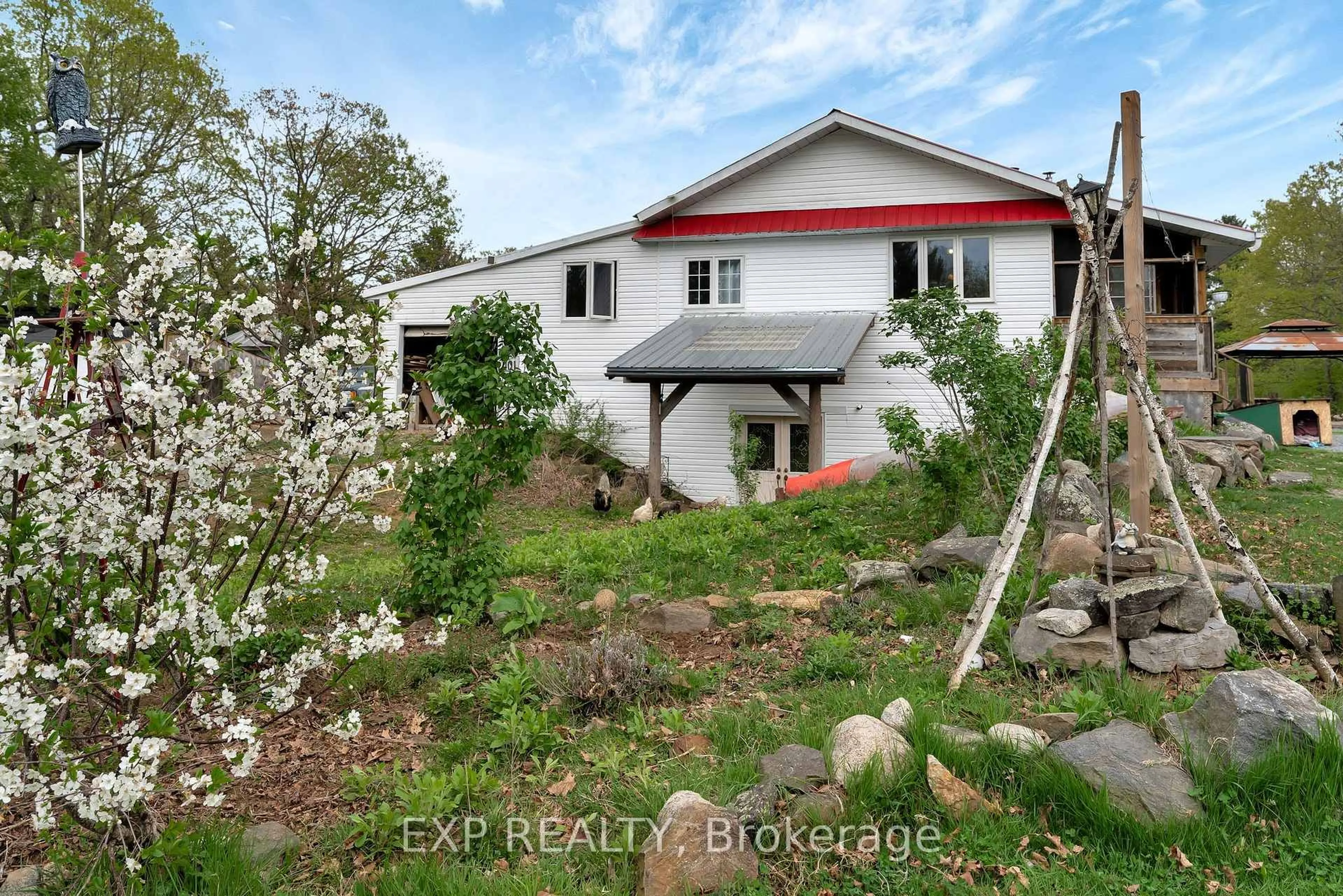 A pic from outside/outdoor area/front of a property/back of a property/a pic from drone, unknown for 3482 County Road 15 Rd, Arden Ontario K0H 1B0