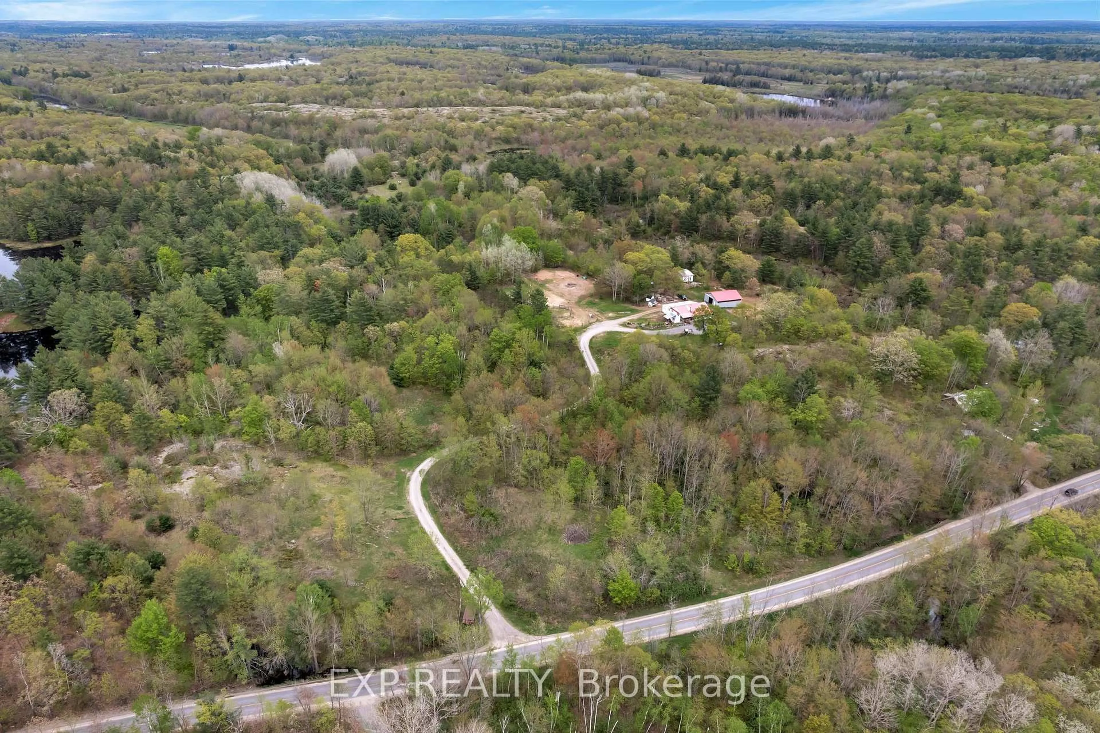 A pic from outside/outdoor area/front of a property/back of a property/a pic from drone, water/lake/river/ocean view for 3482 County Road 15 Rd, Arden Ontario K0H 1B0