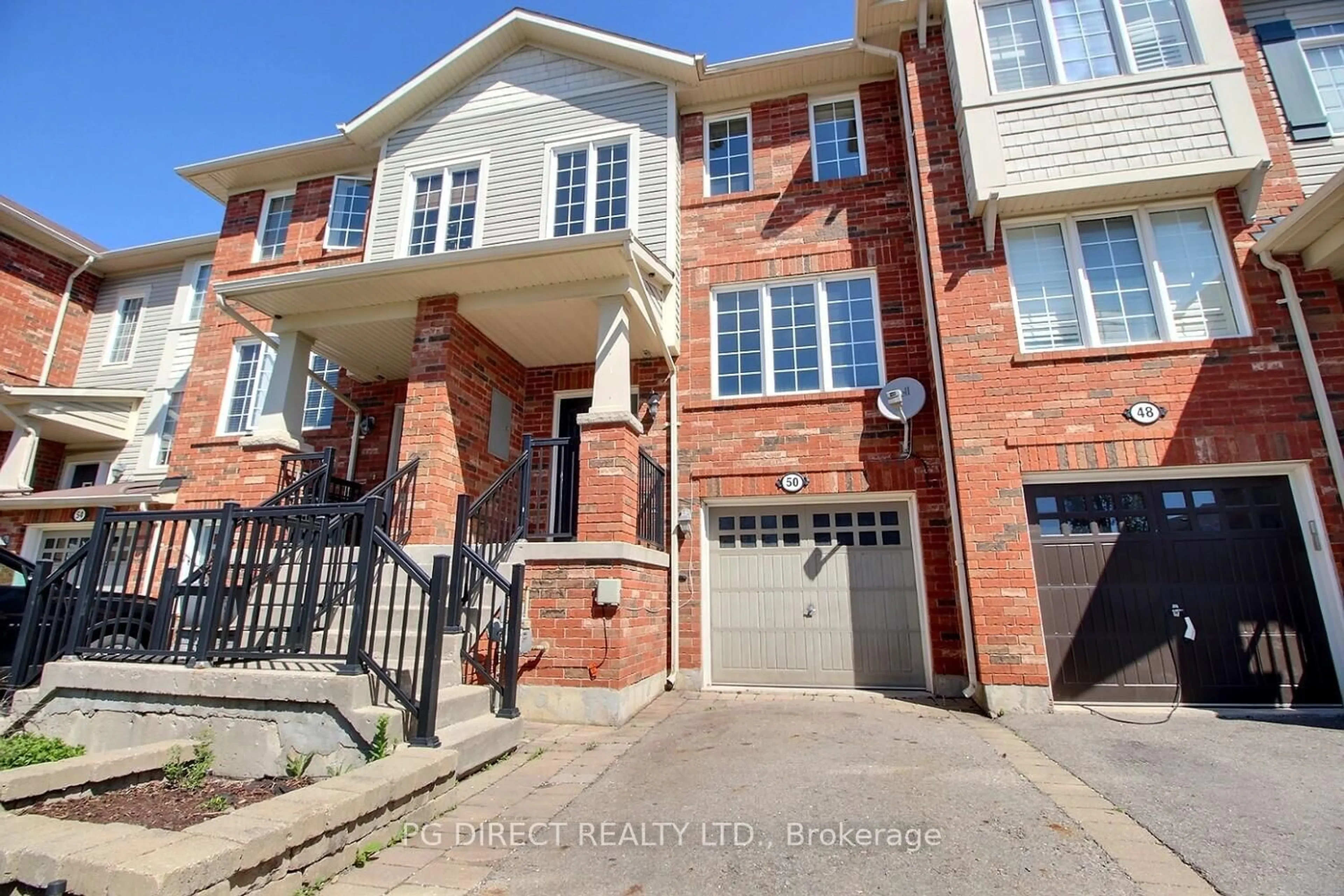 Home with brick exterior material, street for 50 Emick Dr, Hamilton Ontario L9K 0C6