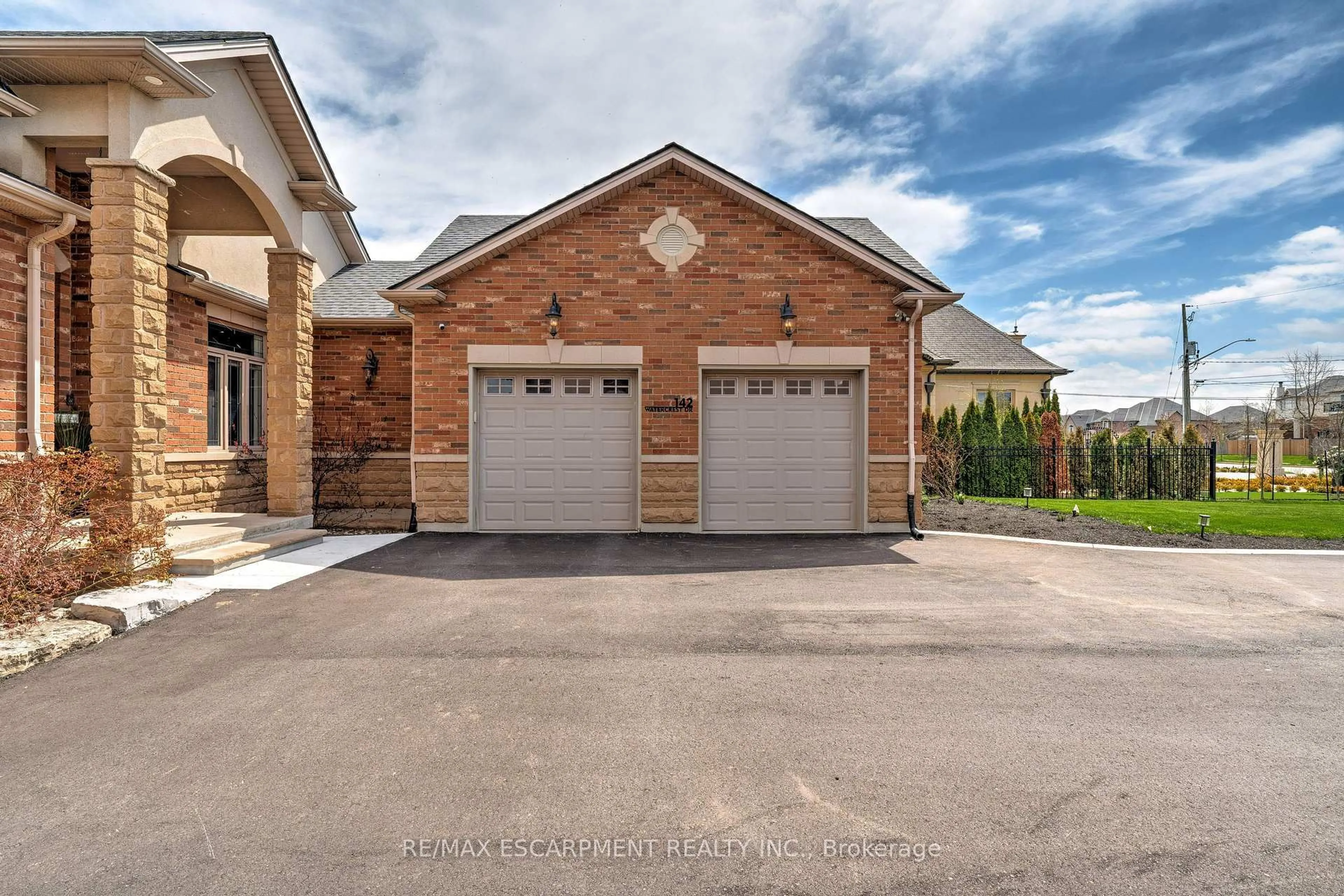 Home with brick exterior material, street for 142 Watercrest Dr, Hamilton Ontario L8E 5C7
