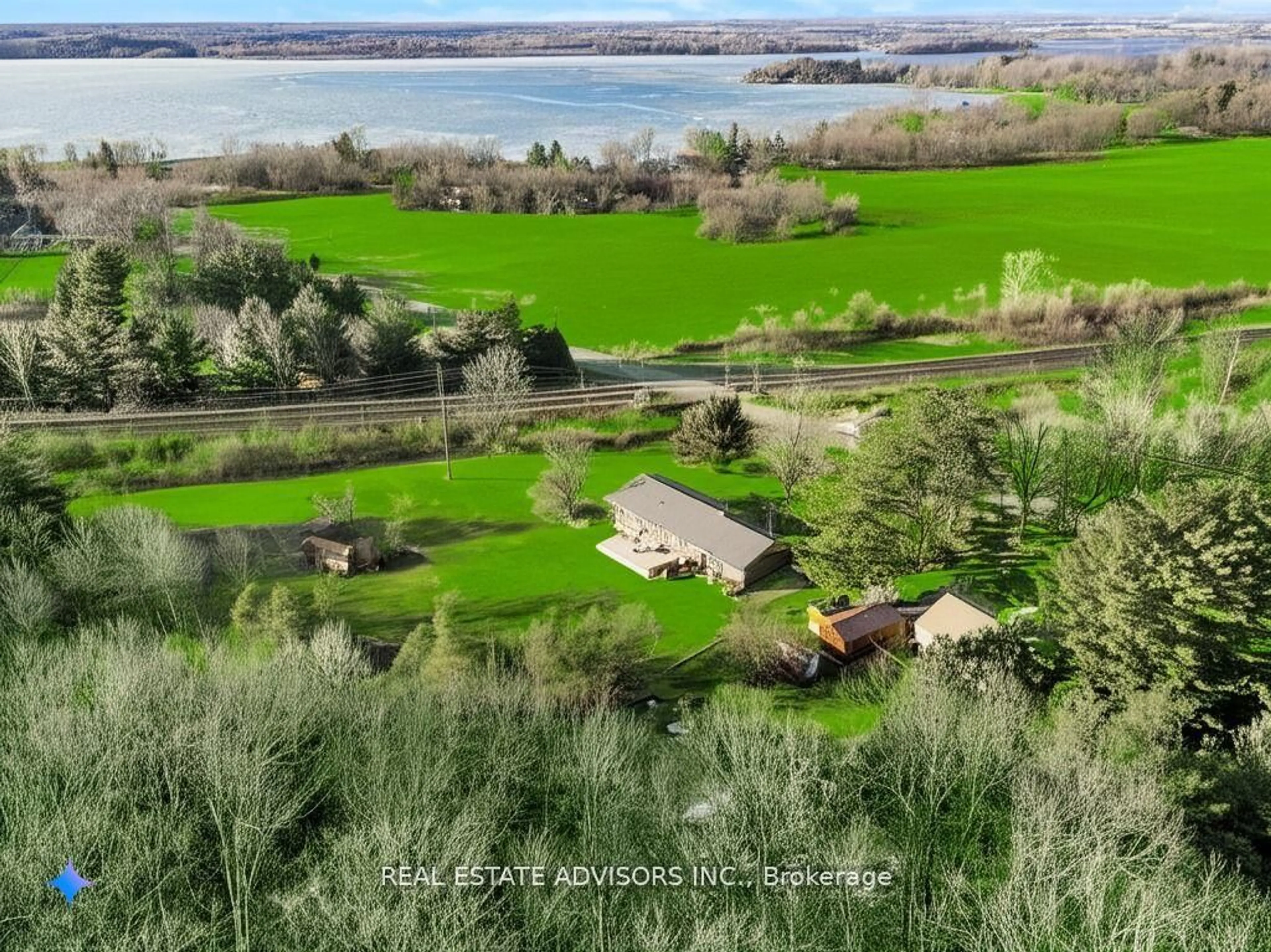 A pic from outside/outdoor area/front of a property/back of a property/a pic from drone, water/lake/river/ocean view for 1633 Station Rd, Kingston Ontario K7L 5H6