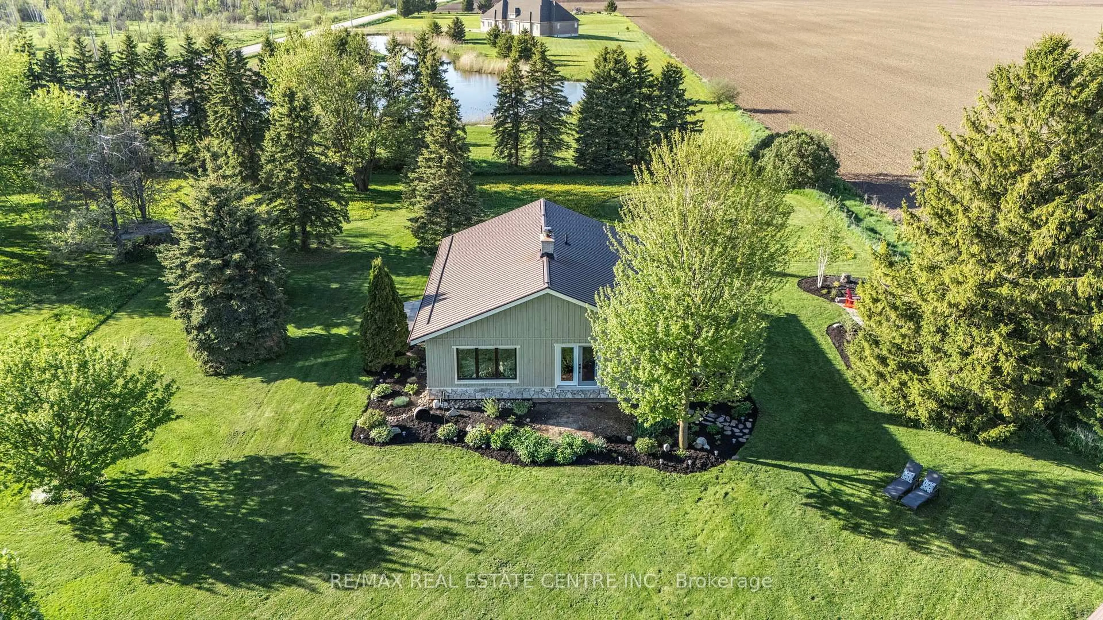 A pic from outside/outdoor area/front of a property/back of a property/a pic from drone, water/lake/river/ocean view for 74019 24 - 25 Sdrd, East Luther Grand Valley Ontario L9W 0J3