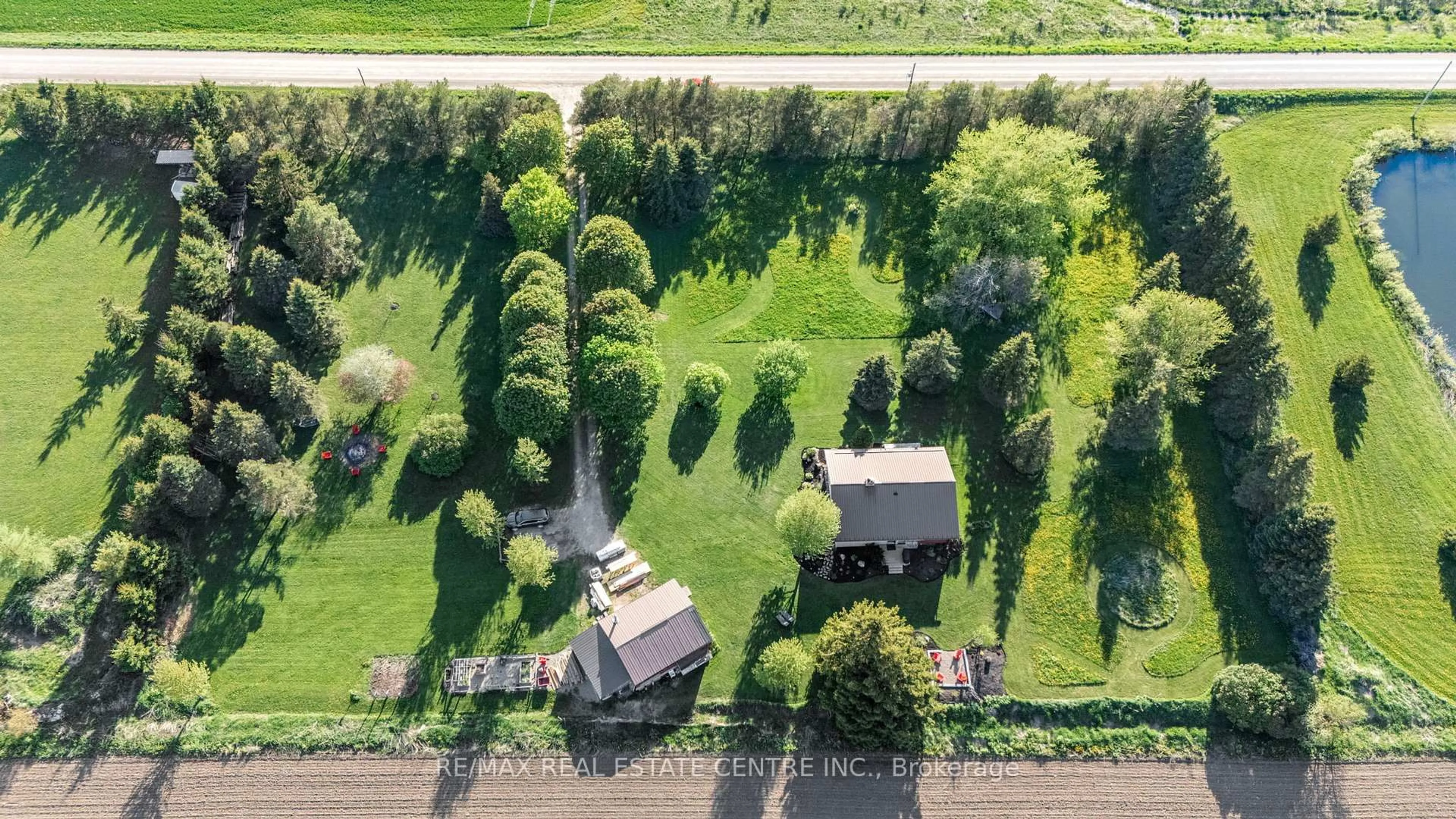 A pic from outside/outdoor area/front of a property/back of a property/a pic from drone, street for 74019 24 - 25 Sdrd, East Luther Grand Valley Ontario L9W 0J3