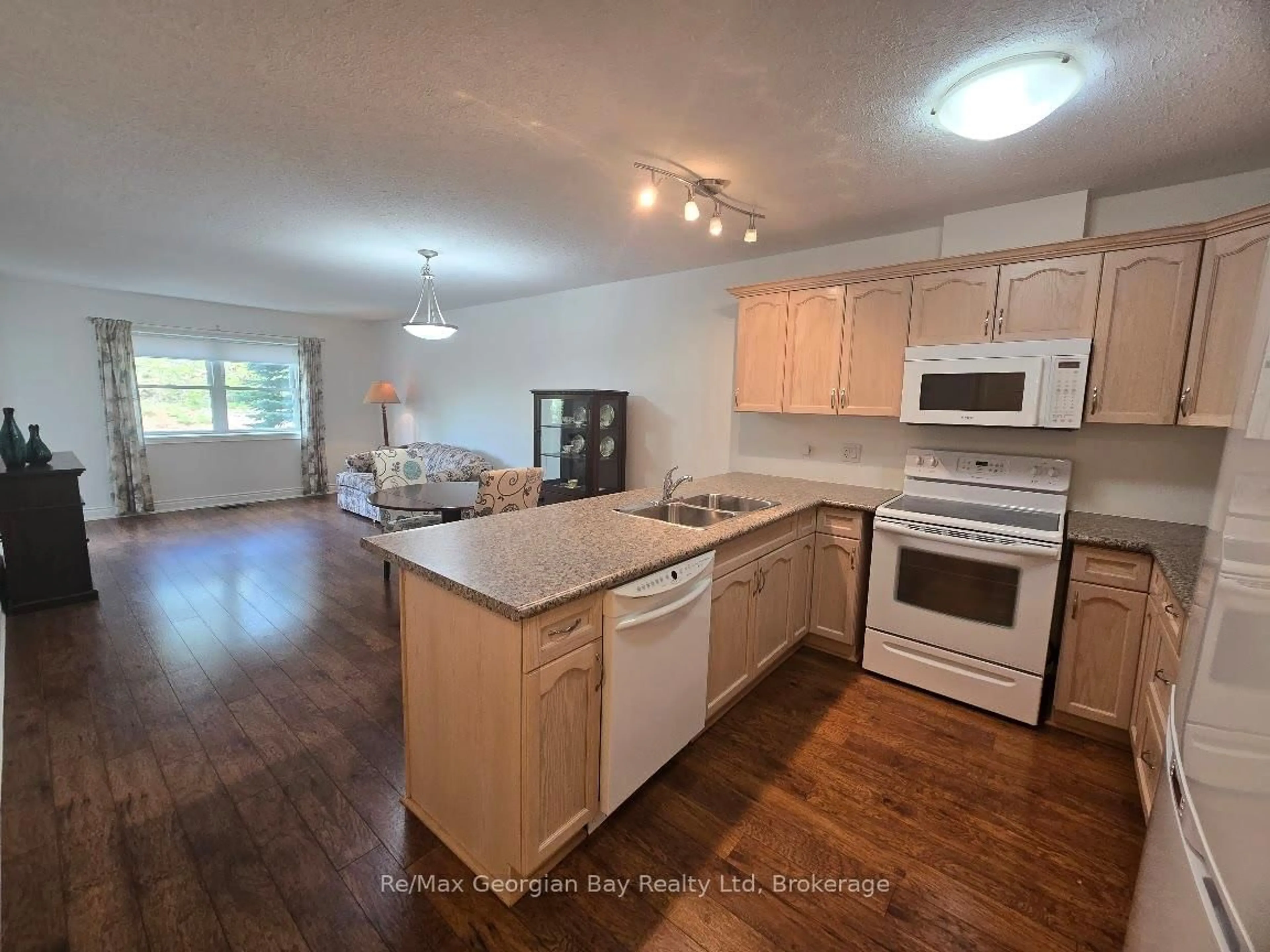 Open concept kitchen, unknown for 10 KIMBERLEY Ave #206, Bracebridge Ontario P1L 0A4