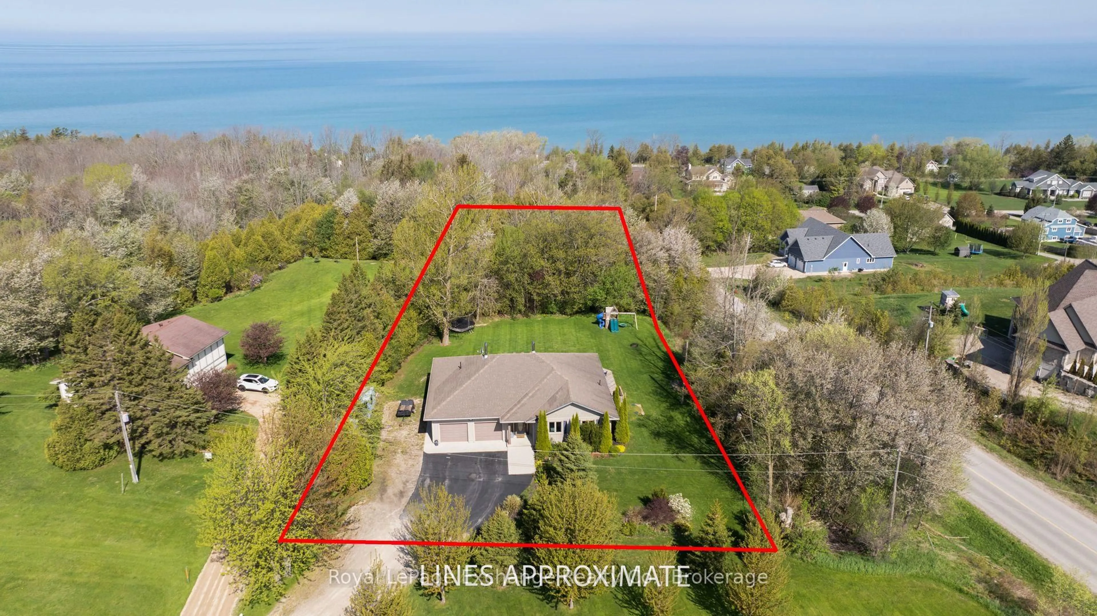 A pic from outside/outdoor area/front of a property/back of a property/a pic from drone, water/lake/river/ocean view for 820 Lake Range Dr, Huron-Kinloss Ontario N2Z 0B3