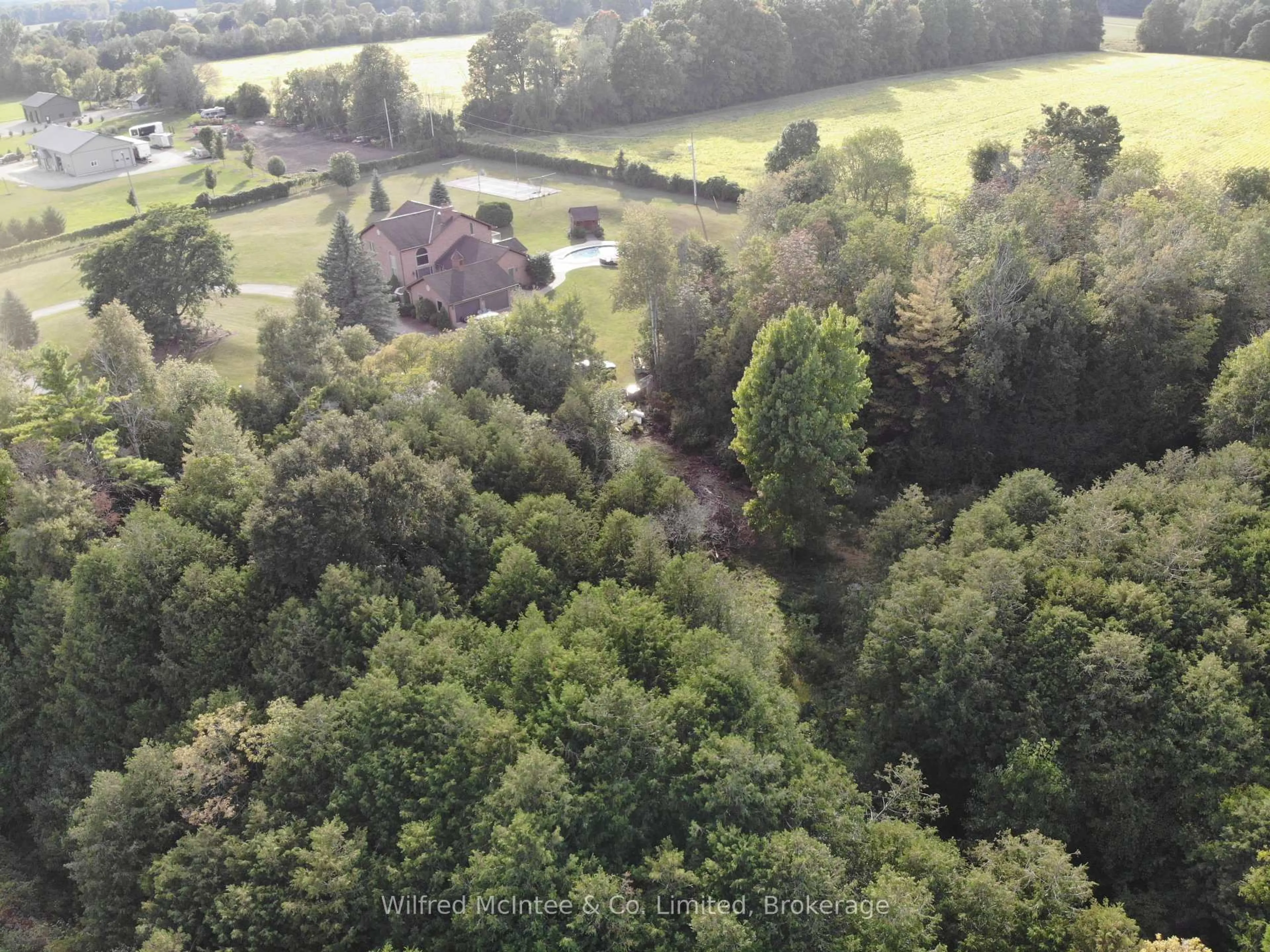 A pic from outside/outdoor area/front of a property/back of a property/a pic from drone, forest/trees view for 75 MARY St, North Huron Ontario N0G 2W0