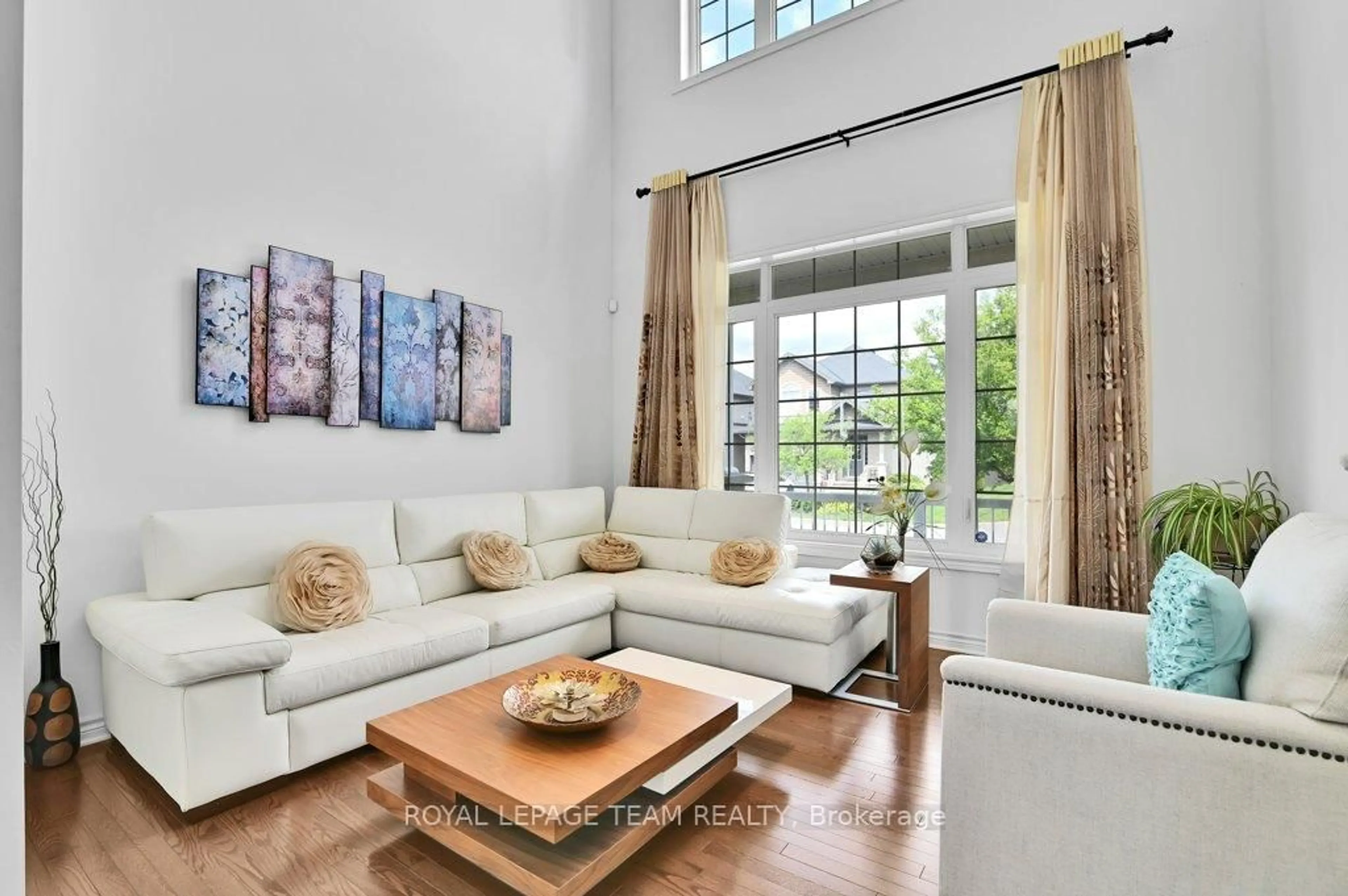 Living room with furniture, ceramic/tile floor for 130 Winterhaven Dr, Ottawa Ontario K1W 0H4