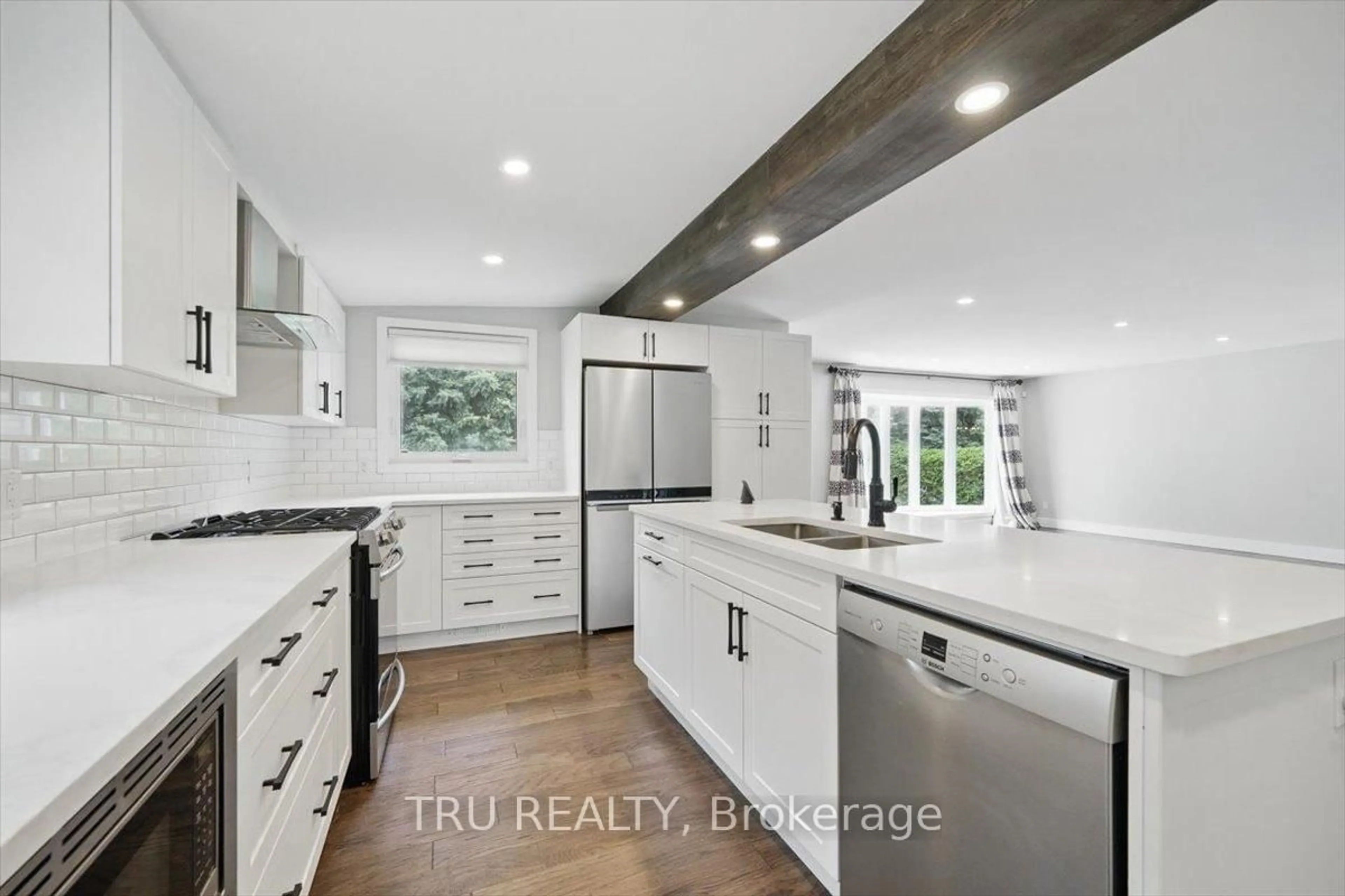 Open concept kitchen, ceramic/tile floor for 2114 Balharrie Ave, Ottawa Ontario K1G 1G5