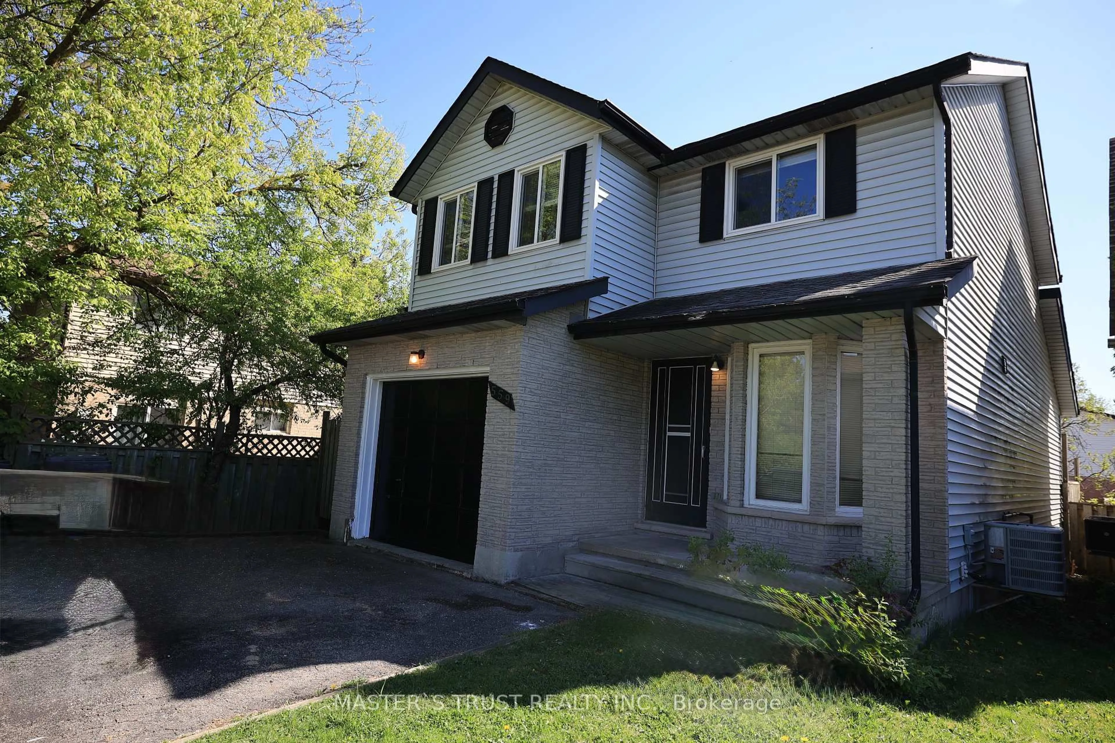 Home with vinyl exterior material, street for 559 Edinburgh Rd, Guelph Ontario N1G 4E7