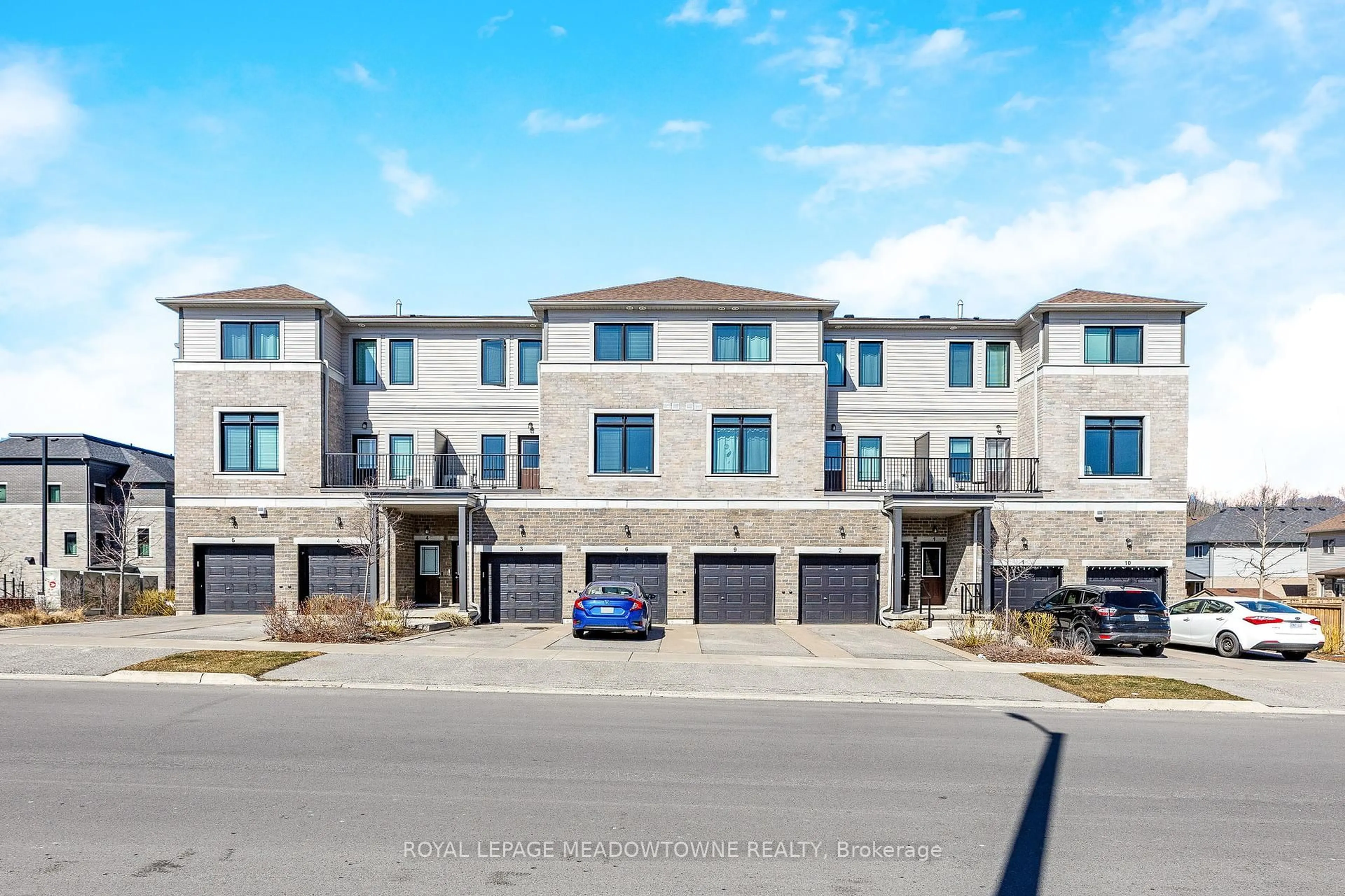 A pic from outside/outdoor area/front of a property/back of a property/a pic from drone, street for 107 Westra Dr #7, Guelph Ontario N1K 0A5