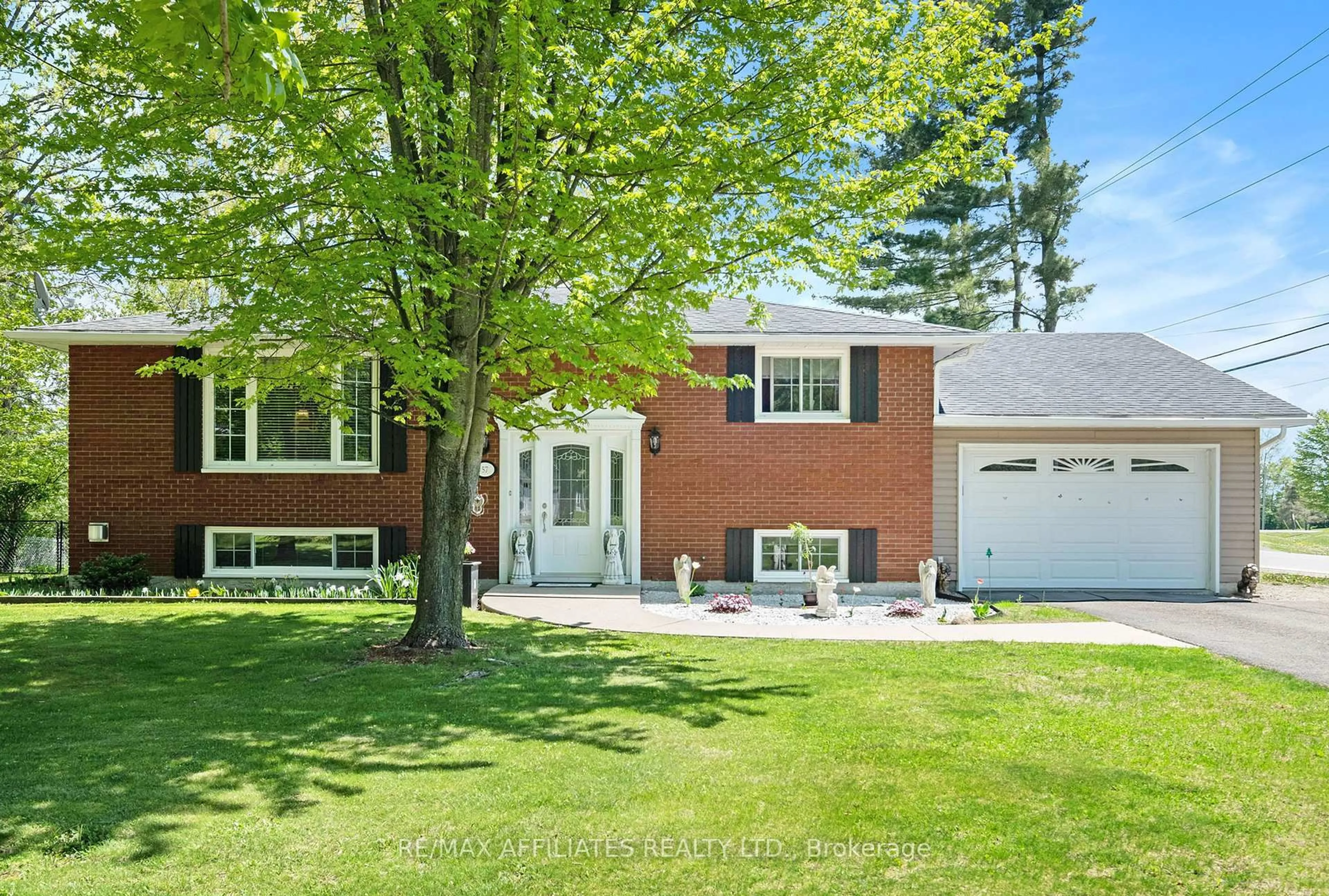Home with brick exterior material, street for 57 Golf Club Rd, Rideau Lakes Ontario K7A 4S5