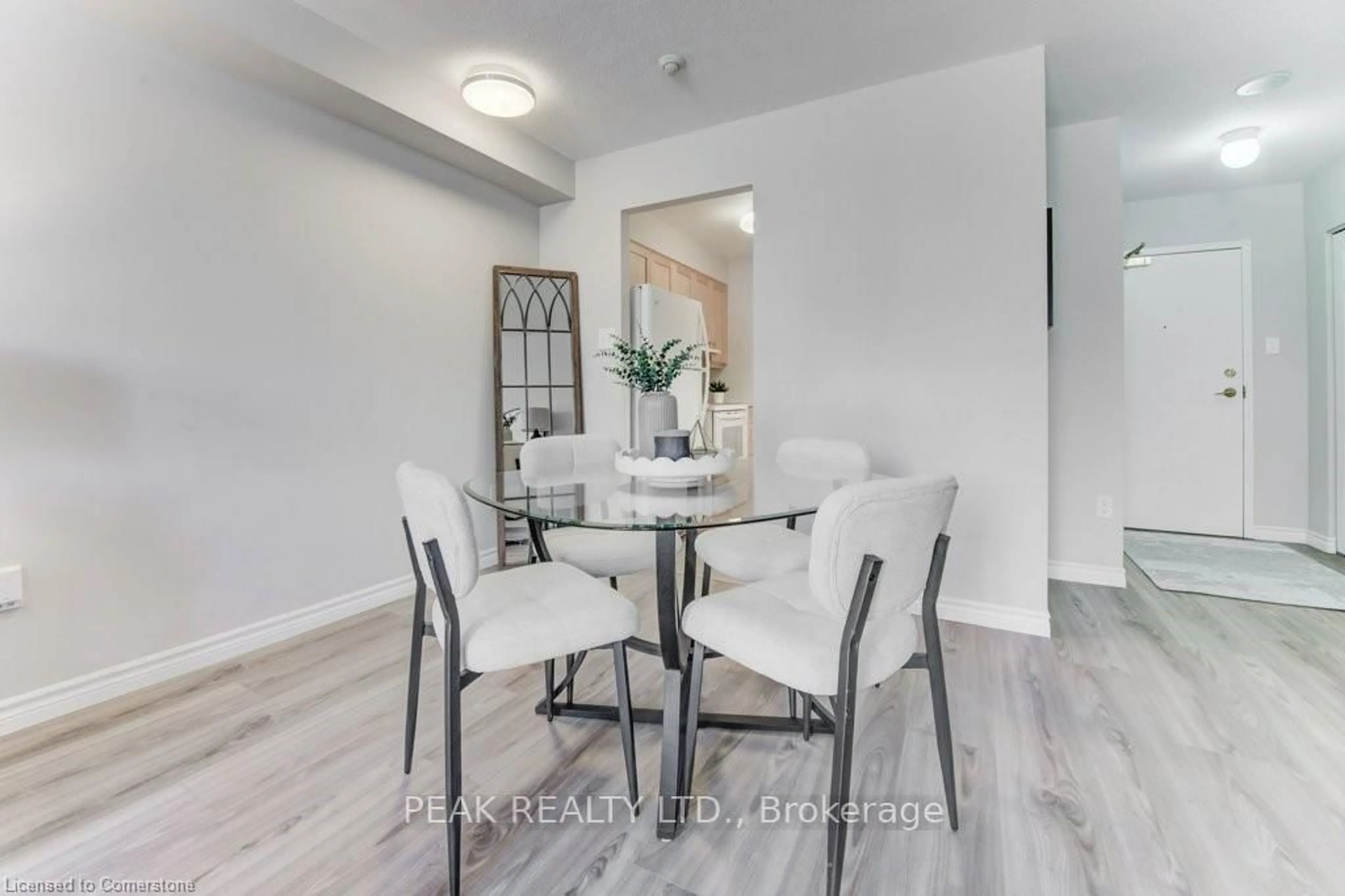 Dining room, wood/laminate floor for 1414 King St #202, Kitchener Ontario N2G 4T8