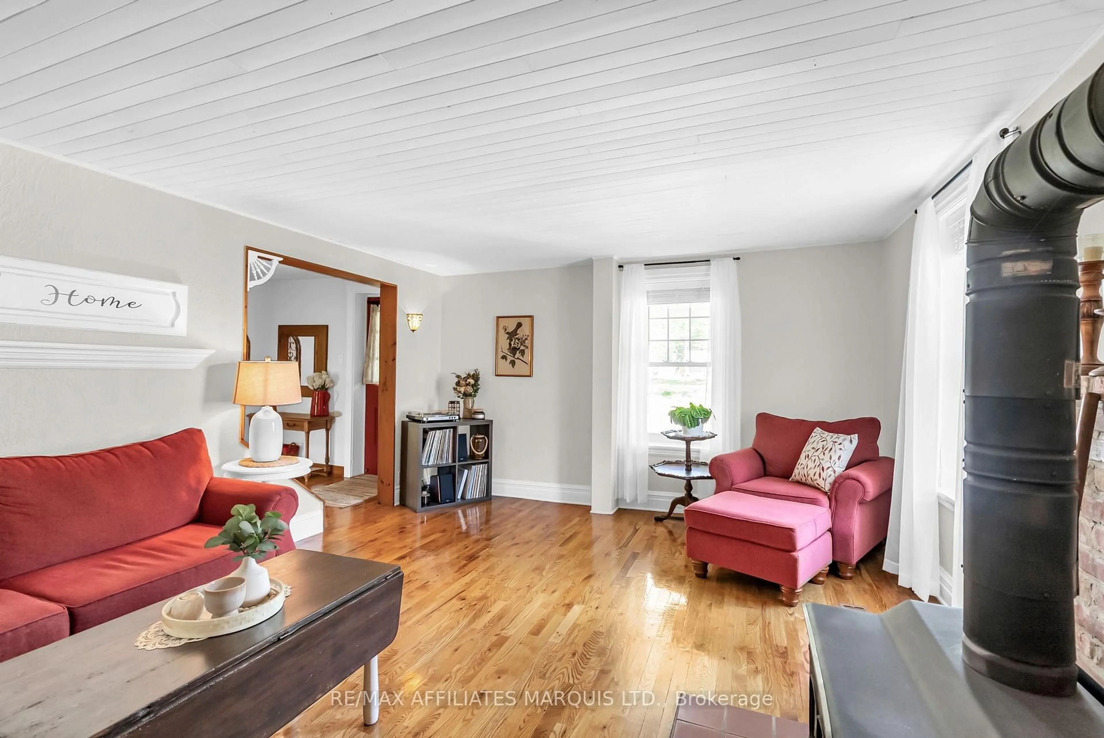 Living room with furniture, wood/laminate floor for 19662 John St, South Glengarry Ontario K0C 2J0