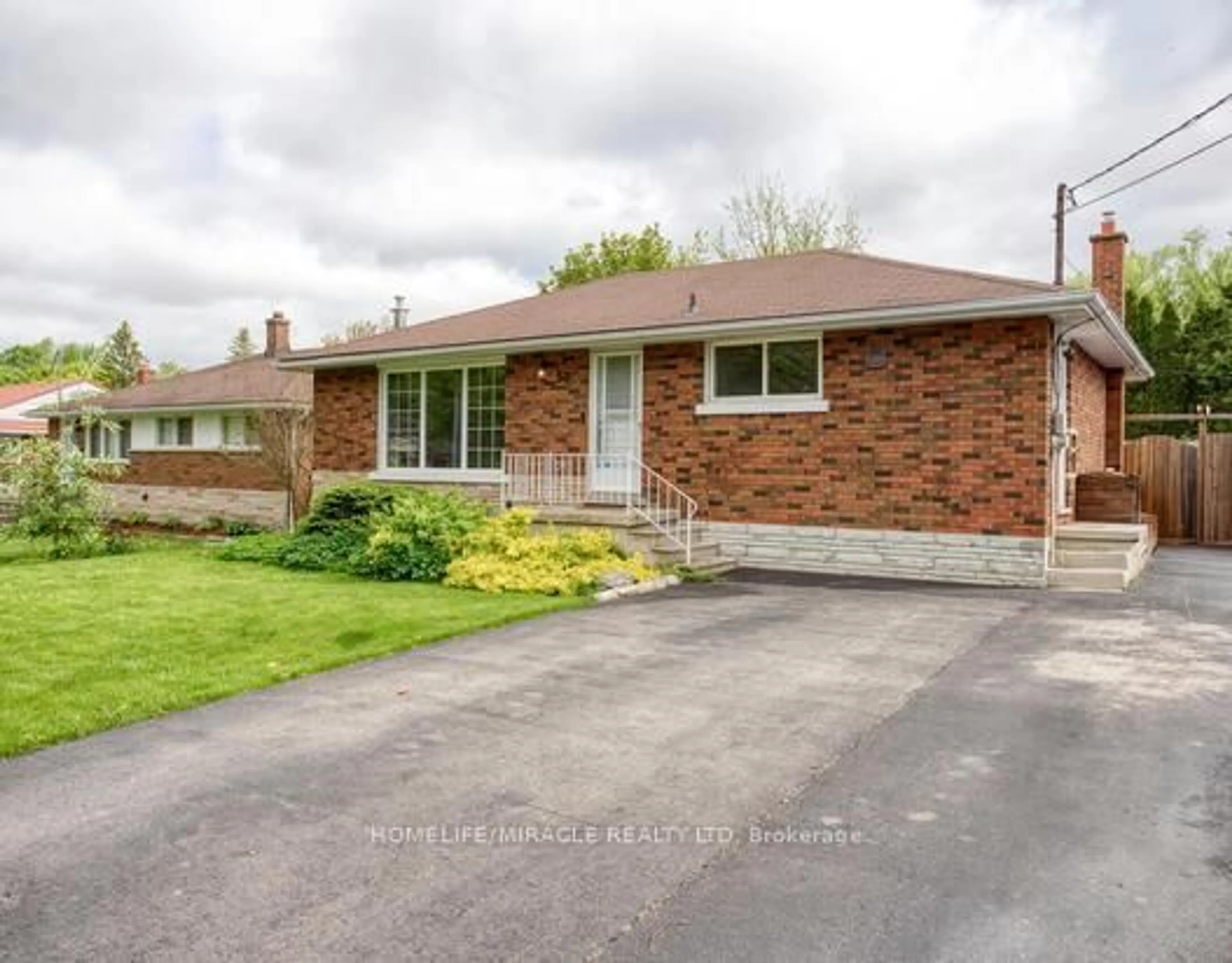 Home with brick exterior material, street for 53 Freeman Ave, Guelph Ontario N1H 4S9