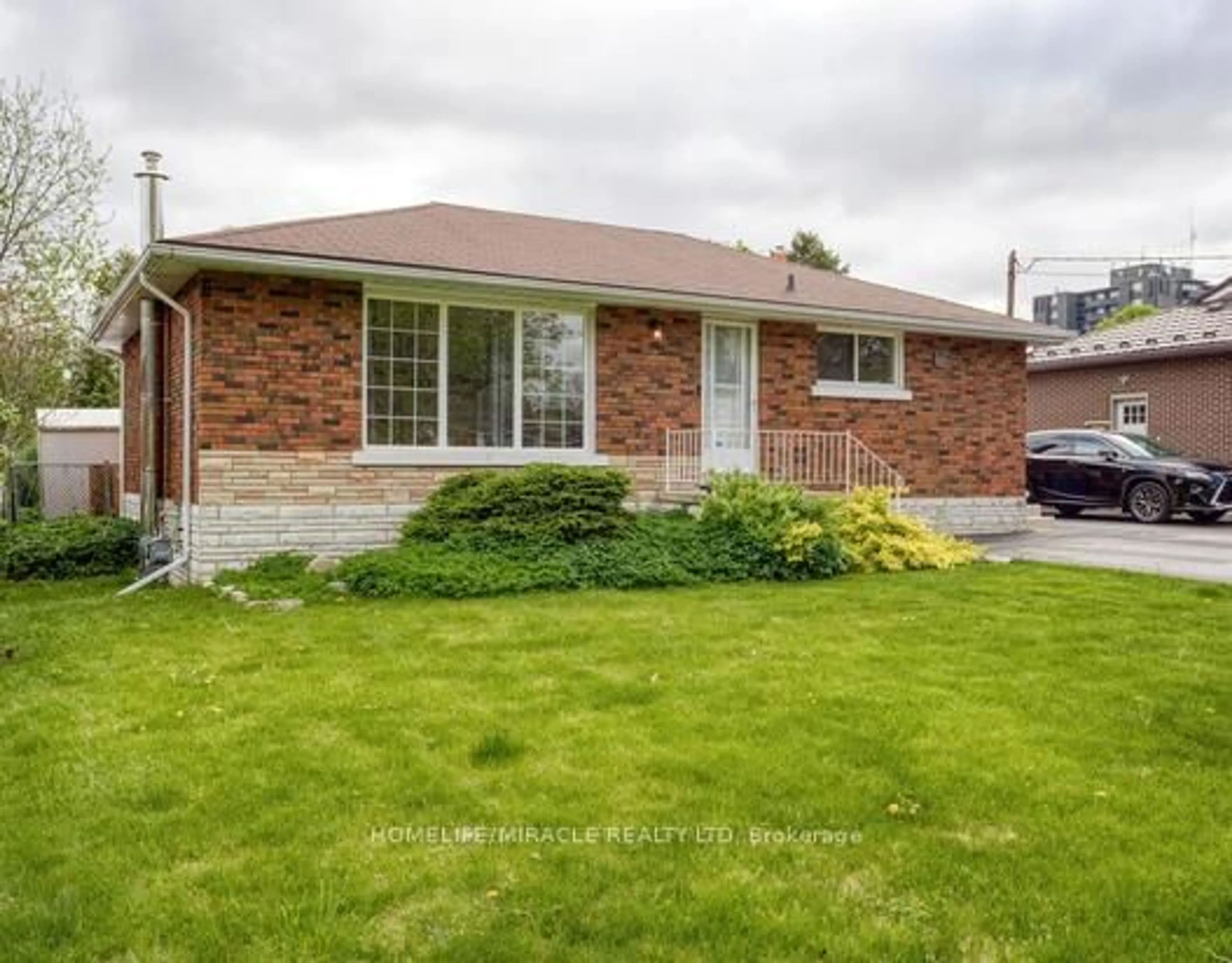 Home with brick exterior material, street for 53 Freeman Ave, Guelph Ontario N1H 4S9