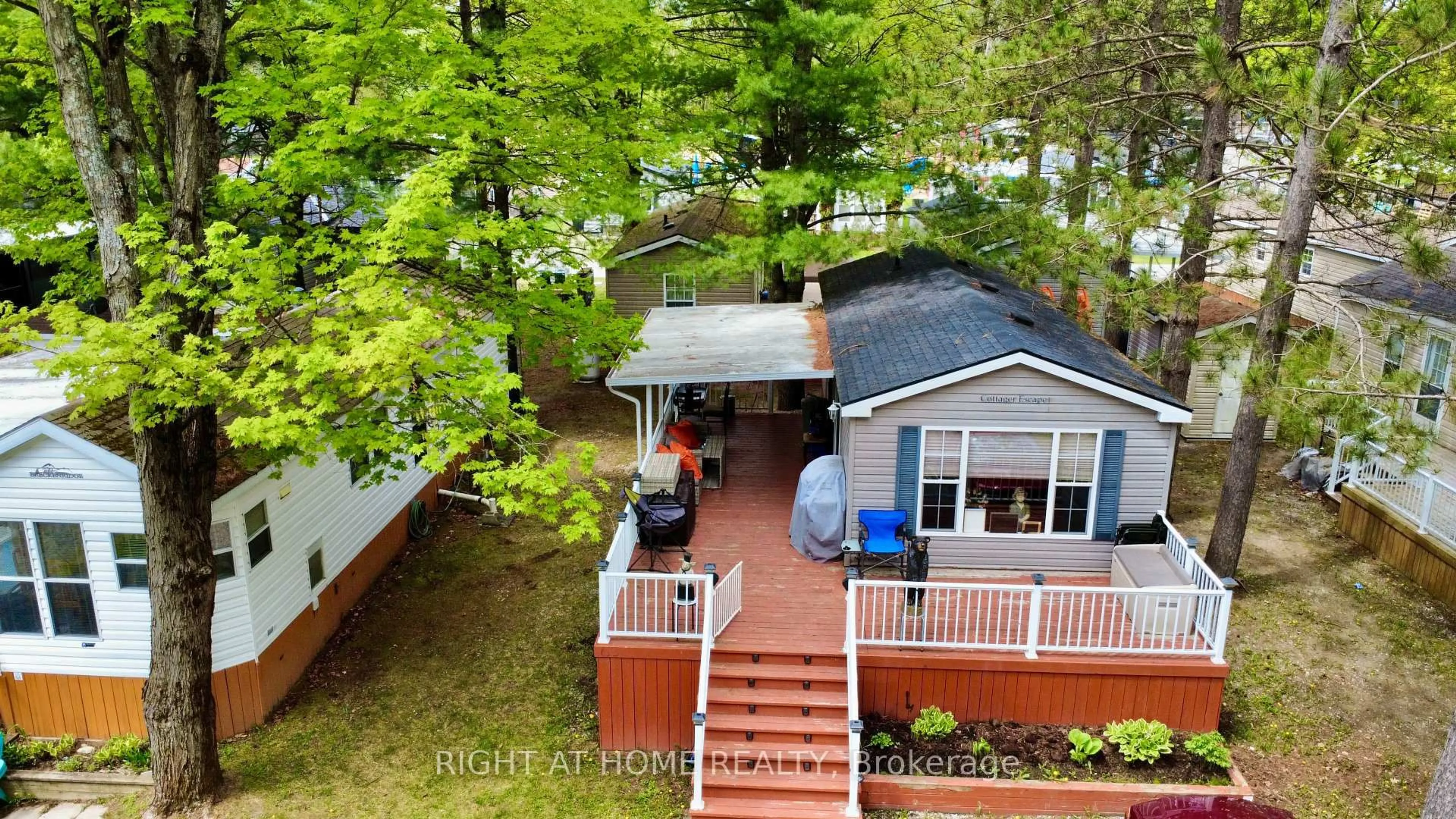 A pic from outside/outdoor area/front of a property/back of a property/a pic from drone, unknown for 1082 Shamrock Marina Rd #63, Gravenhurst Ontario P0E 1N0