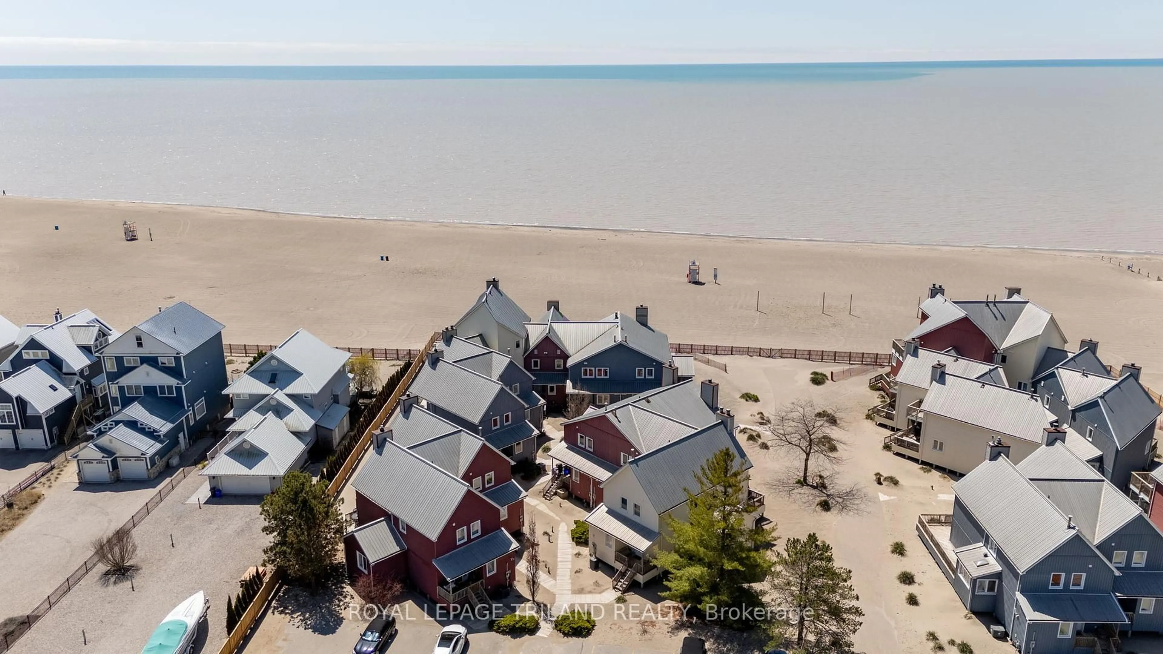 A pic from outside/outdoor area/front of a property/back of a property/a pic from drone, water/lake/river/ocean view for 374 Edith Cavell Blvd #3, Central Elgin Ontario N5L 1E5