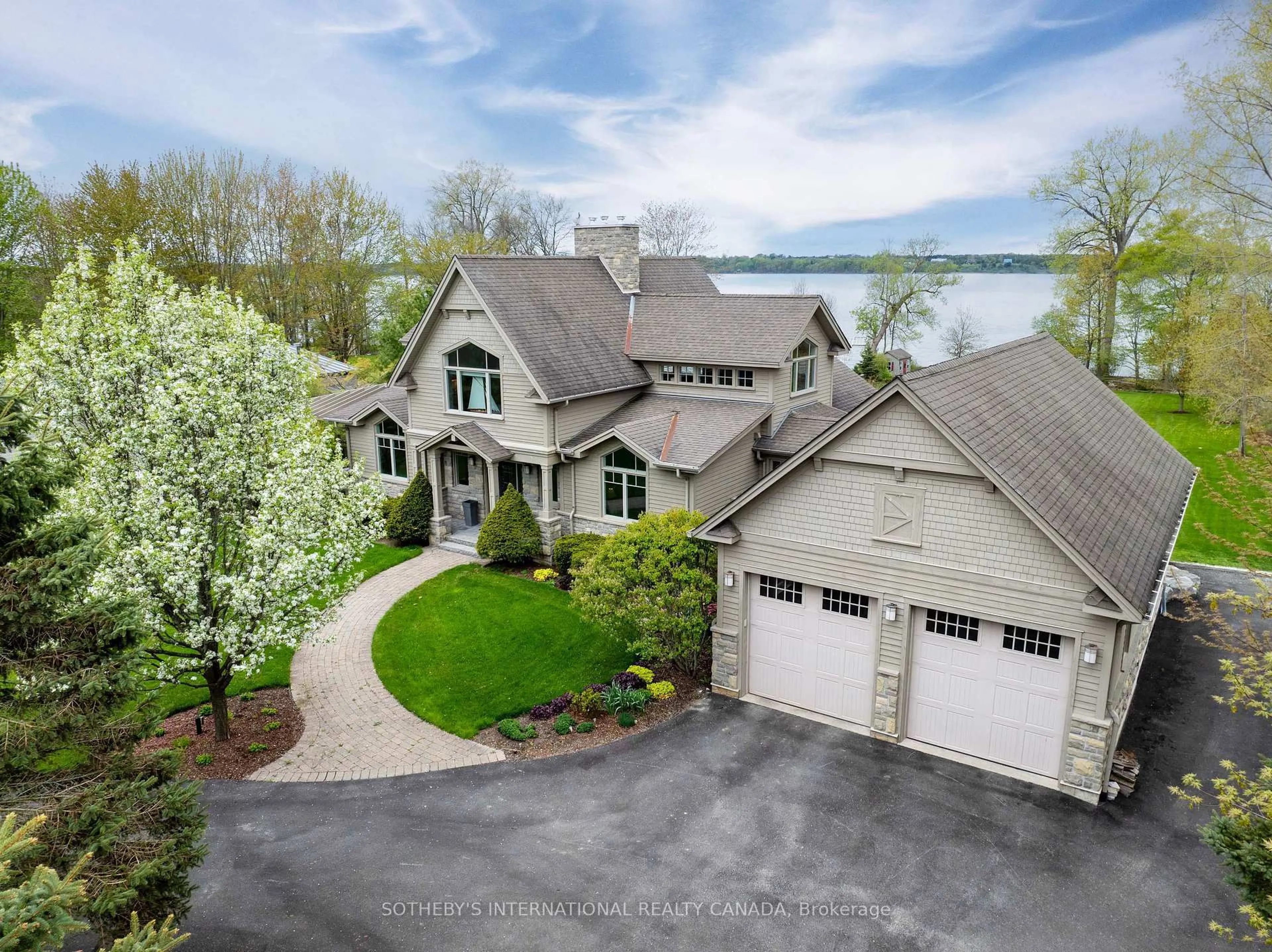 A pic from outside/outdoor area/front of a property/back of a property/a pic from drone, water/lake/river/ocean view for 2921 County Rd 13 Rd, Prince Edward County Ontario K0K 2P0