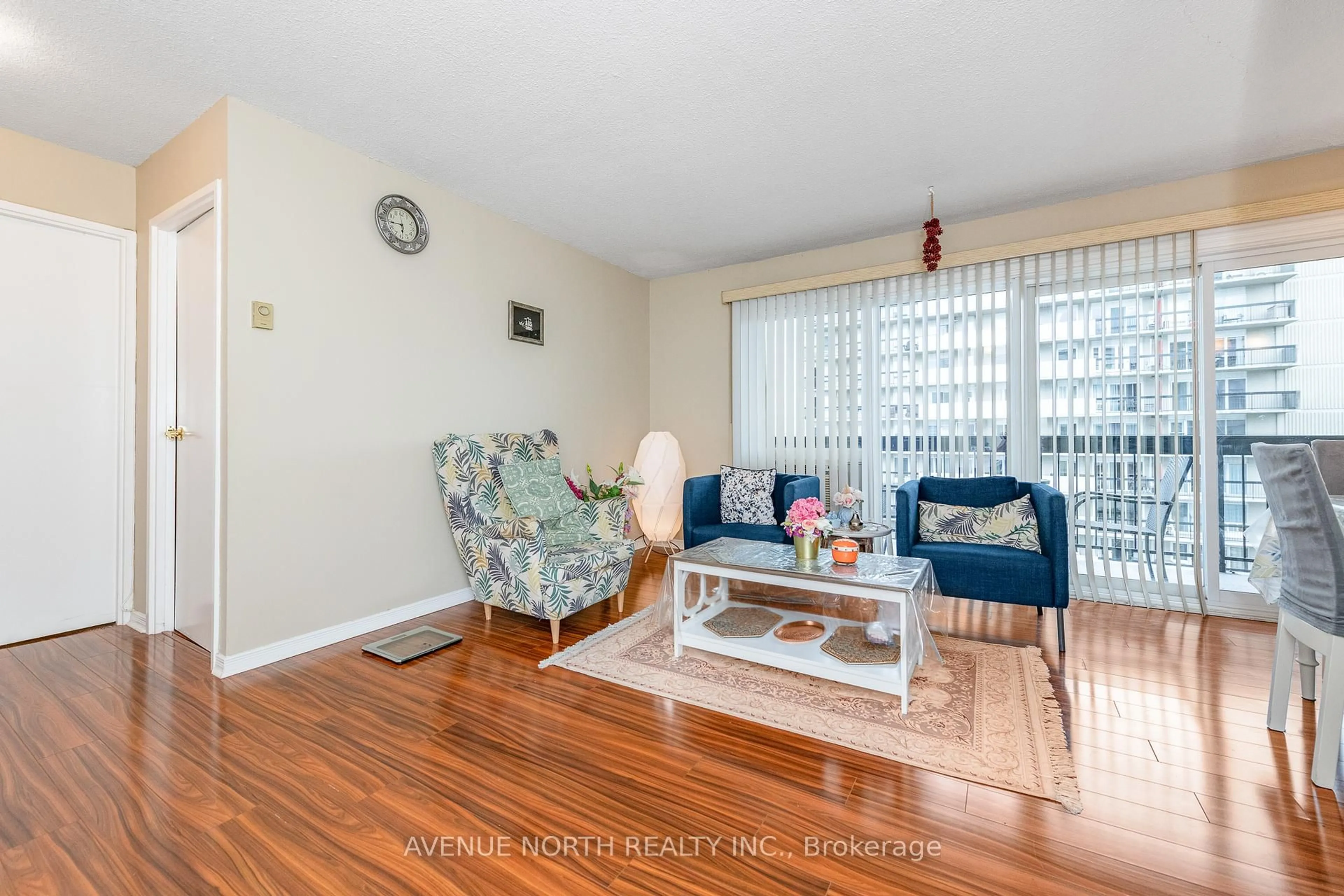 Living room with furniture, wood/laminate floor for 158A Mcarthur Ave #1504, Ottawa Ontario K1L 7E7